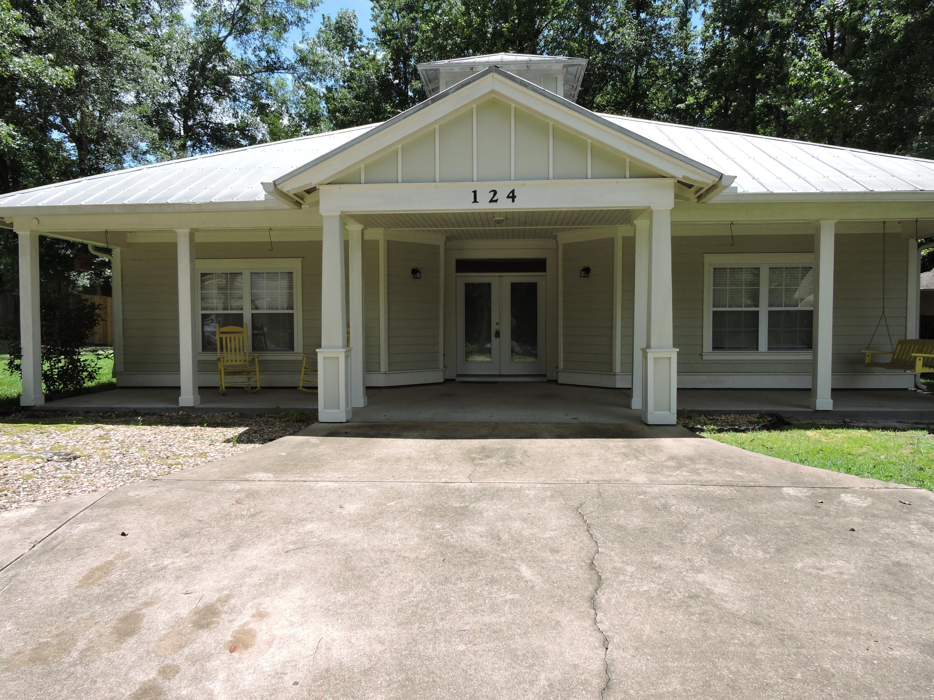 Available Now! Great entertaining home inside and out! Beautiful front porches to relax and enjoy the neighborhood, a circle driveway for plenty of parking for guests, nice screened back porch and a pergola for additional entertaining, even an outside Pizza Oven, there is even a playground for the kids. Conveniently located South of HWY 90 in Foxwood Estates this beautiful Bungalow Style 3 bedroom 2.5 bath home is situated on a wooded lot for privacy with an easy commute to Eglin/7th Group. The open kitchen features granite counter tops, stainless steel appliances with easy access to beautiful covered porch. The master is spacious with beautiful master bath with separate tiled shower and garden tub and ample closet space. Come see this special property.