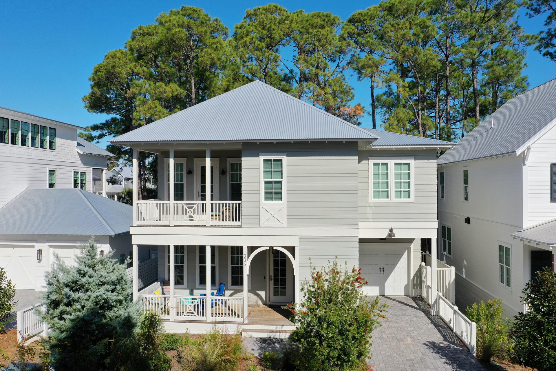 Desirable location!! Custom built by one of the premier builders along 30-A there are many extras and premier finishes such as all hardwood floors throughout, custom lighting (including gas lantern at entrance), granite counter tops, built-in pantry and stainless appliances. Designer tile enhances all bathrooms. Shiplap wood walls in certain areas add to this charming beach house. Second floor offers separate living space and built-in bunks for guests as well as master bedroom with soaking tub in shower and a sitting porch to catch those sea breezes! Lakeside has a community pool and is close to the white sands and emerald waters of Blue Mountain Beach, 30-A. Biking and walking paths are part of this special area of the coast and close to restaurants and shopping.