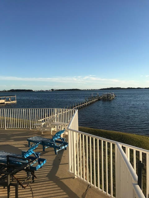 Great opportunity to enjoy a beautiful waterfront location at an affordable price. Spacious waterfront condo only 1 mile from Hurlburt Field. Recently renovated ground floor condo has hard wood floors, several new appliances, large bedrooms, open floorplan kitchen and living room. Two large French doors display the stunning view over the Sound and community pool just off the private patio. Complex also has a small private beach just off the pool area. Don't come see this unit unless you are ready to move, because you will fall in love and never want to leave.