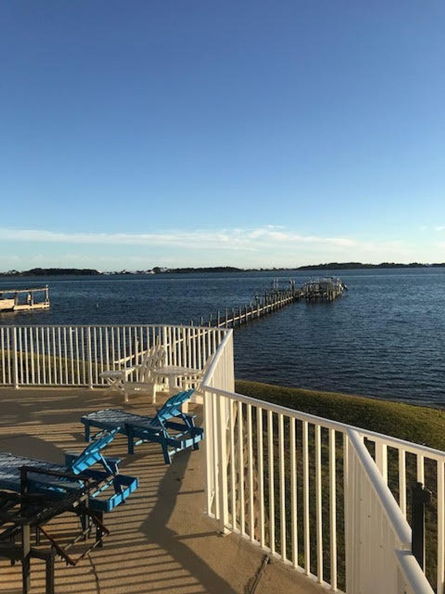 Great opportunity to enjoy a beautiful waterfront location at an affordable price. Spacious waterfront condo only 1 mile from Hurlburt Field. Recently renovated ground floor condo has hard wood floors, several new appliances, large bedrooms, open floorplan kitchen and living room. Two large French doors display the stunning view over the Sound and community pool just off the private patio. Complex also has a small private beach just off the pool area. Don't come see this unit unless you are ready to move, because you will fall in love and never want to leave.