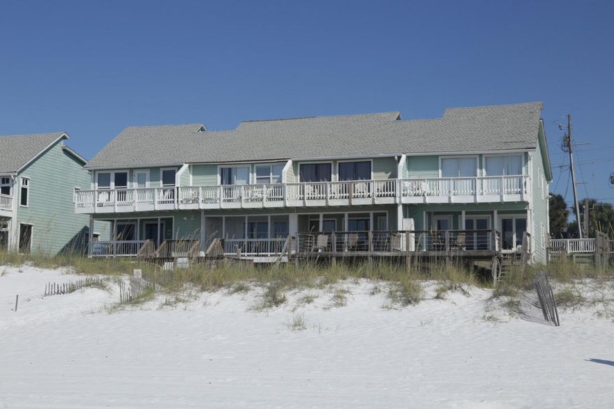 Gulf Front townhome/condo with sweeping gulf views and a direct beach walk from its first floor balcony. This Quiet Surf unit is the perfect vacation investment or residence. Quiet Surf is perfectly positioned along one of Miramar Beach's most private beaches. Enjoy breezy gulf air and exquisite views of emerald waters from the spacious master suite or take in gulf views from the private second floor patio. Offering 1400+ square feet, three parking spaces, and gulf frontage, this 2BR/2.5BA coastal cottage is a vacation rental winner. Call for your private showing.