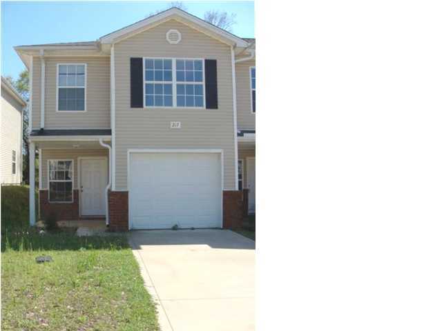 WONDERFUL 2-STORY TOWNHOUSE WITH LOTS OF SPECIAL FEATURES. THE EXTERIOR IS WORRY-FREE VINYL AND BRICK WITH DIMENSIONAL SHINGLED ROOF. ENERGY EFFICIENT ALL ELECTRIC. CEILING FANS IN THE LIVING ROOM AND BEDROOMS. SPACIOUS ROOMS THROUGHOUT. NICE KITCHEN HAS SOLID SURFACE COUNTERS, UNDER-MOUNT SINK, BREAKFAST BAR, LOTS OF OAK CABINETS, AND A BUILT-IN-MICROWAVE OVER THE STOVE. TILE FLOORS IN THE FOYER, HALL KITCHEN & BATHS, CARPET EVERYWHERE ELSE. HALF BATH WITH PEDESTAL SINK AND PRETTY MIRROR FOR YOUR GUESTS. MASTER SUITE HAS A WALK IN CLOSET AND DUAL VANITIES IN THE BATH. INSIDE LAUNDRY. PATIO IN THE BACKYARD. 1-CAR GARAGE