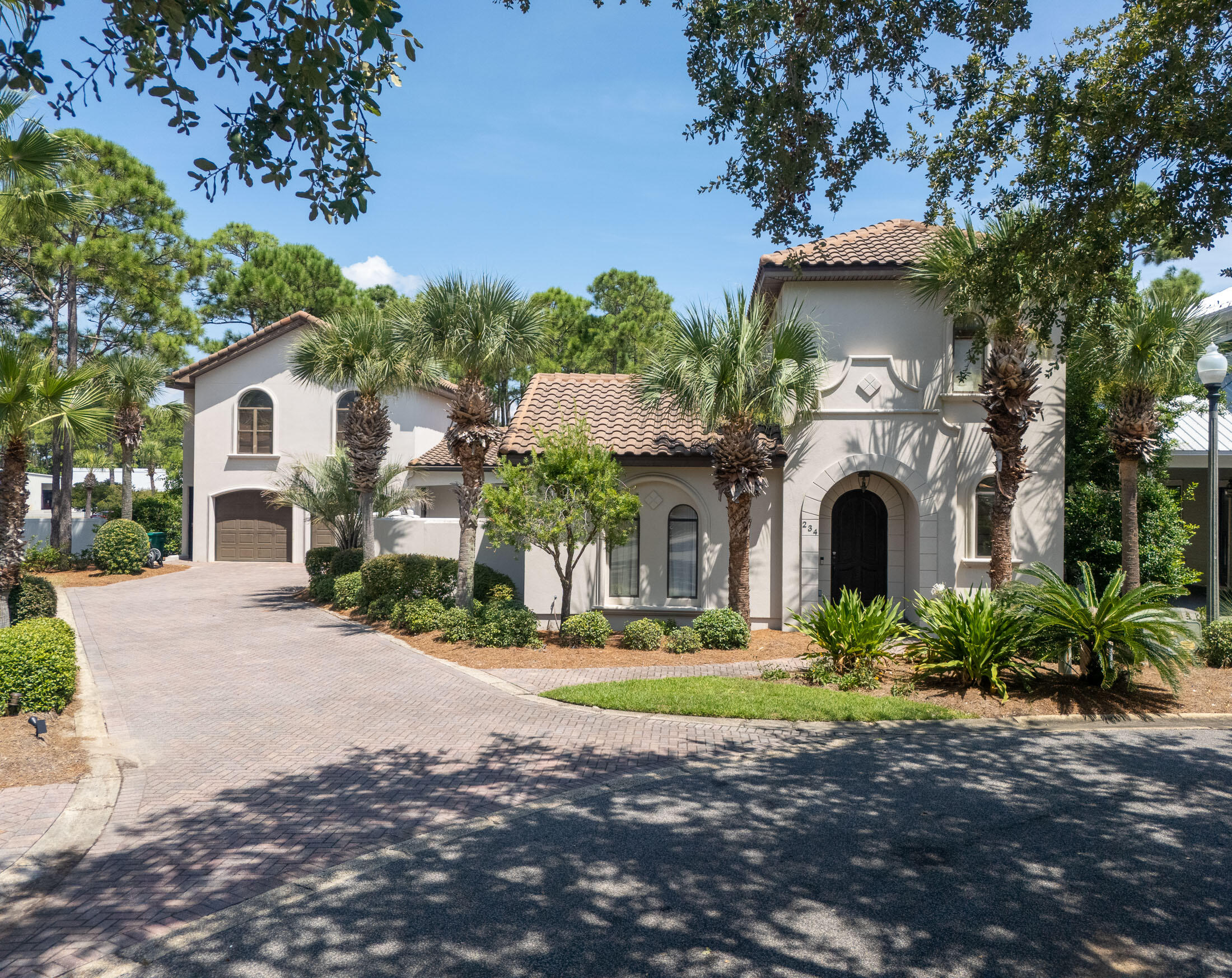 What a Beautiful Spanish style architecture home near the beach! This house has 10 ft ceilings, travertine floors, gourmet kitchen and much more!! This house is perfect for a primary residence, second home or vacation rental property. Located in the private gated community of Emerald Waters, with 2 community pools and only a 5 minute walk to the deeded beach access. The main house has approx. 3300 sq ft with 5 bedrooms and 4 baths. Carriage house has 475 sq ft with 1 bedroom, full bath, washer/dryer and spacious living/kitchen area, luxurious bath with custom stone walk-in shower and whirlpool tub. This home has a private walled and gated courtyard with a spa-like setting that includes a heated pool.