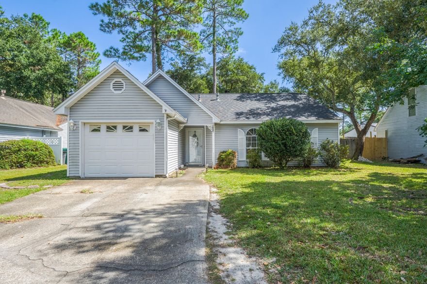 CLOSING COSTS PAID BY SELLER! Just a few minutes to either Eglin or Hurlburt. This wonderful 3 bedroom 2 bath home features a neighborhood with a community pool. As you walk in your eyes will be drawn to the laminate flooring and warm rich colors. You will also notice the fire place with shiplap accents which adds to the warm and inviting living space.  The homes kitchen features granite countertops, stainless steel appliances. The gas range tile backsplash creates a kitchen you will love to be in. Just down the hall you will have 2 bedrooms as well as the the Master. The Master Bedroom has plenty of room for a king size bed. The Master Bath has been upgraded with a Barn Door, mirror, and Vanity. The back yard is an oasis of it's own with a pergola and fire pit. Come see it today!
