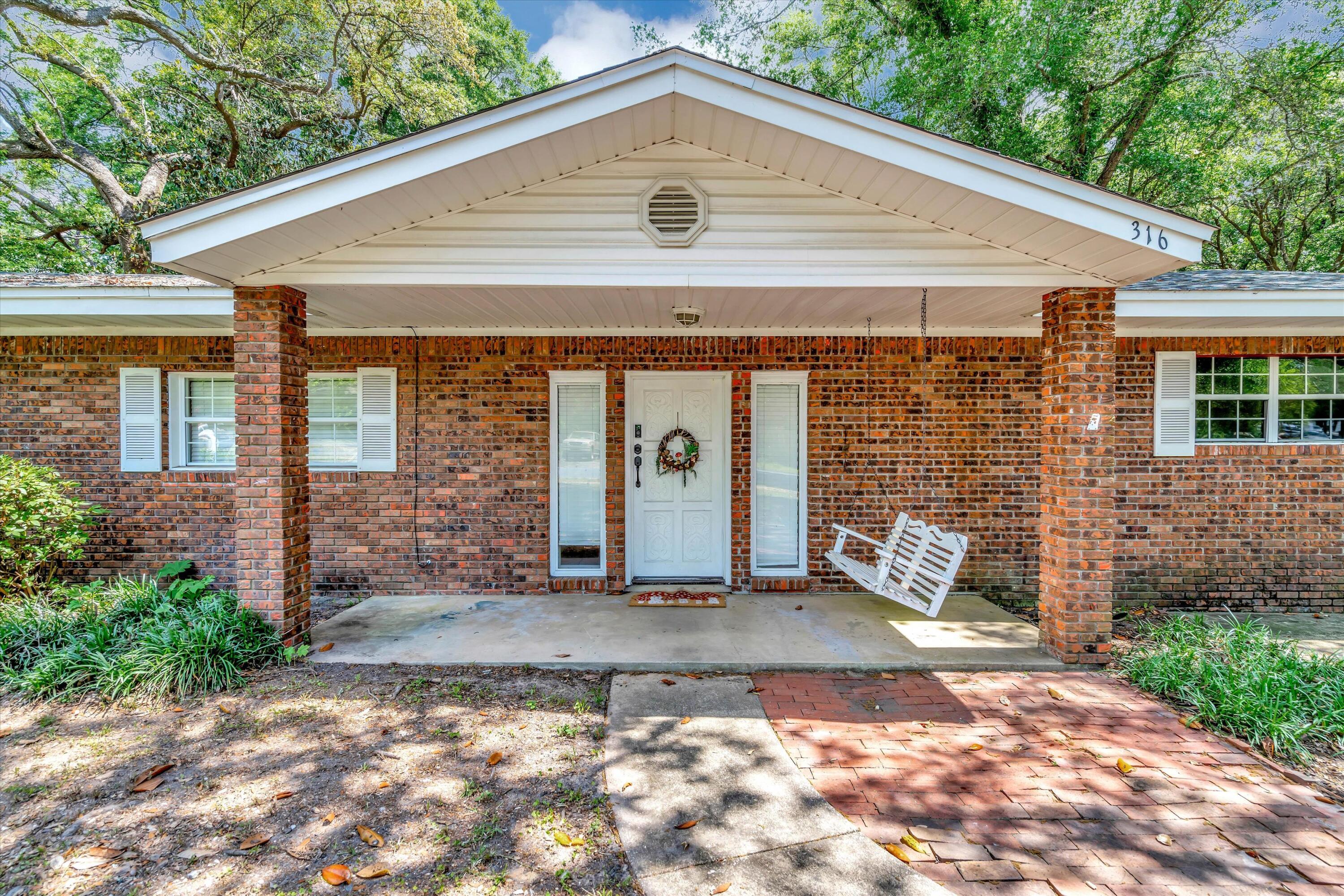Check out this charming all-brick residence just minutes away from Eglin's East Gate. Boasting 4 bedrooms and 2 bathrooms. The roof, water heater, refrigerator, and dishwasher were all replaced in 2022, while the entire house now features new Pex plumbing. Enjoy added privacy with a newly installed 6 ft privacy fence and a brand-new shed. The spacious backyard offers ample space for a future pool. Inside, the raised ceiling with exposed wooden beams creates a cozy atmosphere in the living area and kitchen. The open floor plan seamlessly connects the kitchen, dining, and living spaces, centered around a stunning authentic brick fireplace with wood storage.
