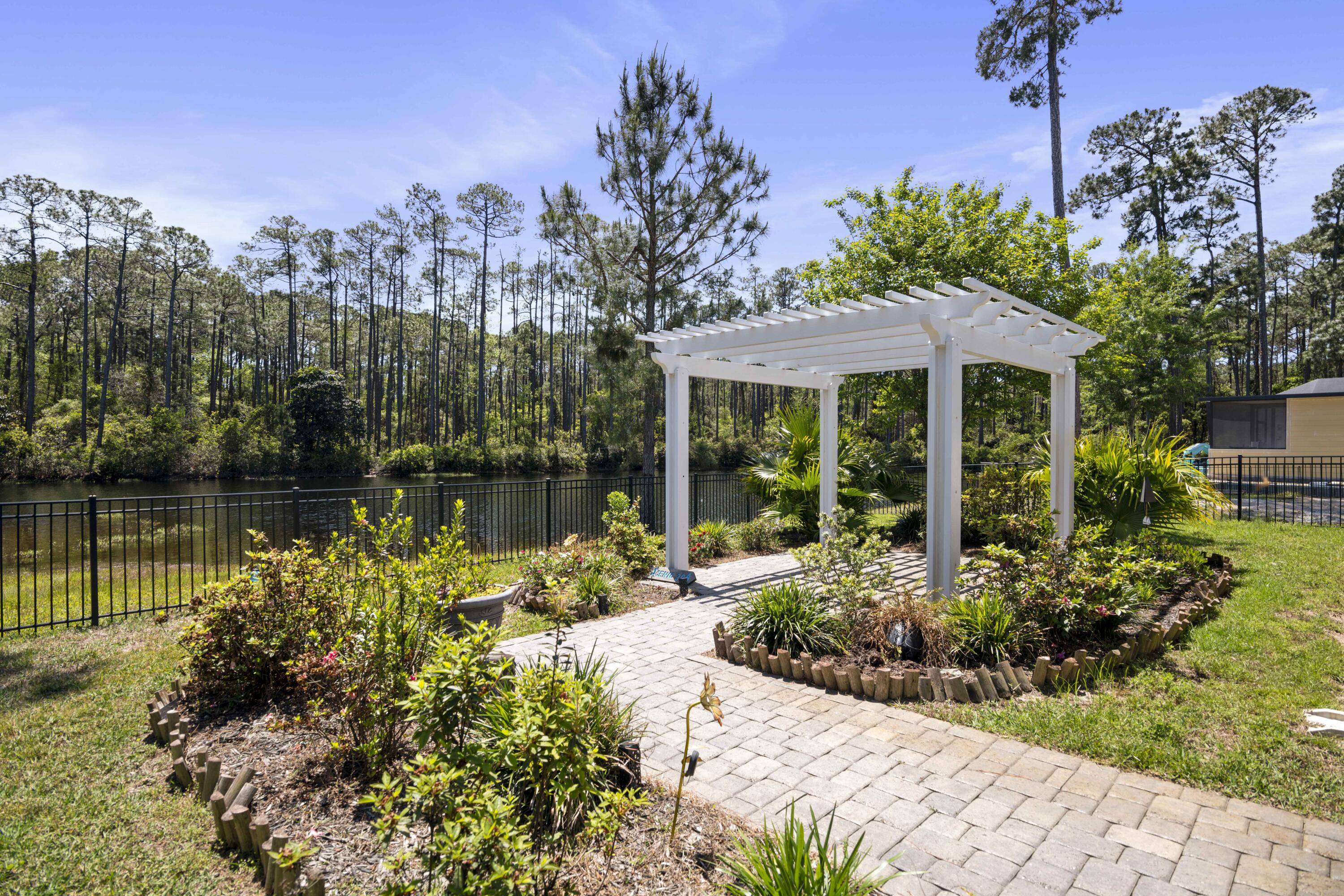 Imagine sitting in your backyard while watching beautiful wildlife as you watch the sunrise.Enjoy some peace & quiet just steps in your own backyard.Tucked in only 15 minutes to the beach and 1 block from the bay!The home sits on a beautiful lot that backs up to a small serene pond with beautiful wildlife. It is an extremely well-kept and updated 3/2 with a bonus room.HUGE BONUS, the solar panels come with the home,bringing your monthly electricity down to around 90% less than your normal bill,huge SAVINGS! Incredible custom floors in the garage.Amazing upgrades like UV/ozone generator/WIFI Sprinklers Sprinklers & Wifi Garage Door openers. LVP floors throughout.So many upgrades and features to list them all, you have to come and see it for yourself! Hurry and see it today!
