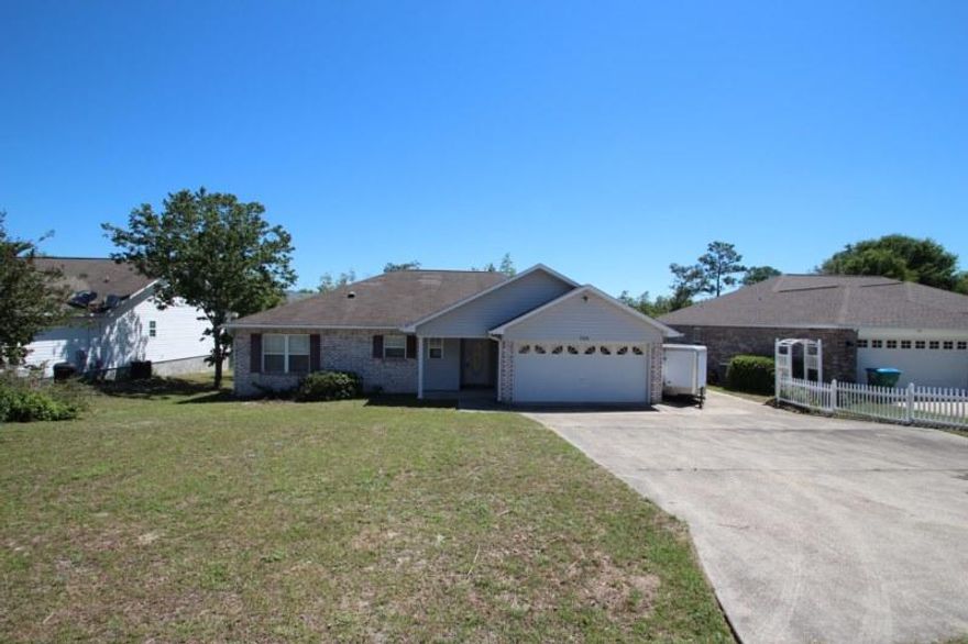 Real Estate Owned REO, CLOSE TO SHOPPING AND MEDICAL FACILITIES. POPULAR SPLIT BEDROOM PLAN FEATURES: LARGE EAT-IN KITCHEN OPEN TO GREATROOM HAS ISLAND, PLENTY OF CABINETS & DRAWERS, LAZY SUSAN, PANTRY, PLENTY OF ELECTICAL OUTLETS & COUNTER SPACE, BUILT-IN MICROWAVE,DISHWASHER AND STOVE INCLUDED; FAMILY ROOM WITH GAS LOG FIREPLACE AND PLANT LEDGES; FRENCH DOORS LEADING TO FLORIDA ROOM/DEN/OFFICE/OR WHATEVER YOU WANT TO USE IT FOR;TV CABLE AND PHONE JACKS IN ALL ROOMS, INCLUDING THE MASTER BATH; ATTIC STORAGE WITH PULL DOWN STAIRS; SIDE EXIT DOOR TO EXTENDED DRIVEWAY PAD FOR RV OR BOAT WITH DEDICATED OUTLET; OVERSIZED PATIO;INSIDE LAUNDRY ROOM AND MUCH MORE. CALL TO TAKE A LOOK TODAY.