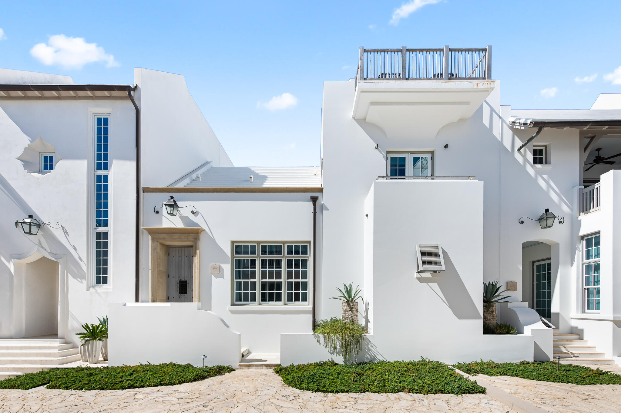 Description Copy:Fronting Sea Garden Pedestrian Path South of 30A in Alys Beach, 20 Shinbone Court, designed by acclaimed architect Gary Justiss and built by Davis Dunn Construction, offers the highest level of craftsmanship and quality of finishes that sets this house apart. Just steps from private beach access, this four-bedroom, four full-bath, two half-bath custom home features an open and inviting floor plan that seamlessly flows to the outdoor living spaces. A private first floor primary bedroom suite overlooks Sea Garden Pedestrian Path and welcomes the morning light. From the reclaimed beams of the first floor great room to the vaulted wood ceiling of the second floor living room, a variety of detailed ceiling woodwork is enjoyed throughout the different rooms of the house. An elevator to the third floor makes the water views from the rooftop terrace effortless.
Looking out to the private courtyard, a conditioned pool room is one of the favorite features to those that know this house. This space serves as the perfect spot to relax and enjoy the pool/hot tub views along with the double-sided fireplace which ensures the cozy ambience of this coastal retreat is felt whether inside or outside. Recently refurnished by SummerStory Design, 20 Shinbone conveys fully furnished.