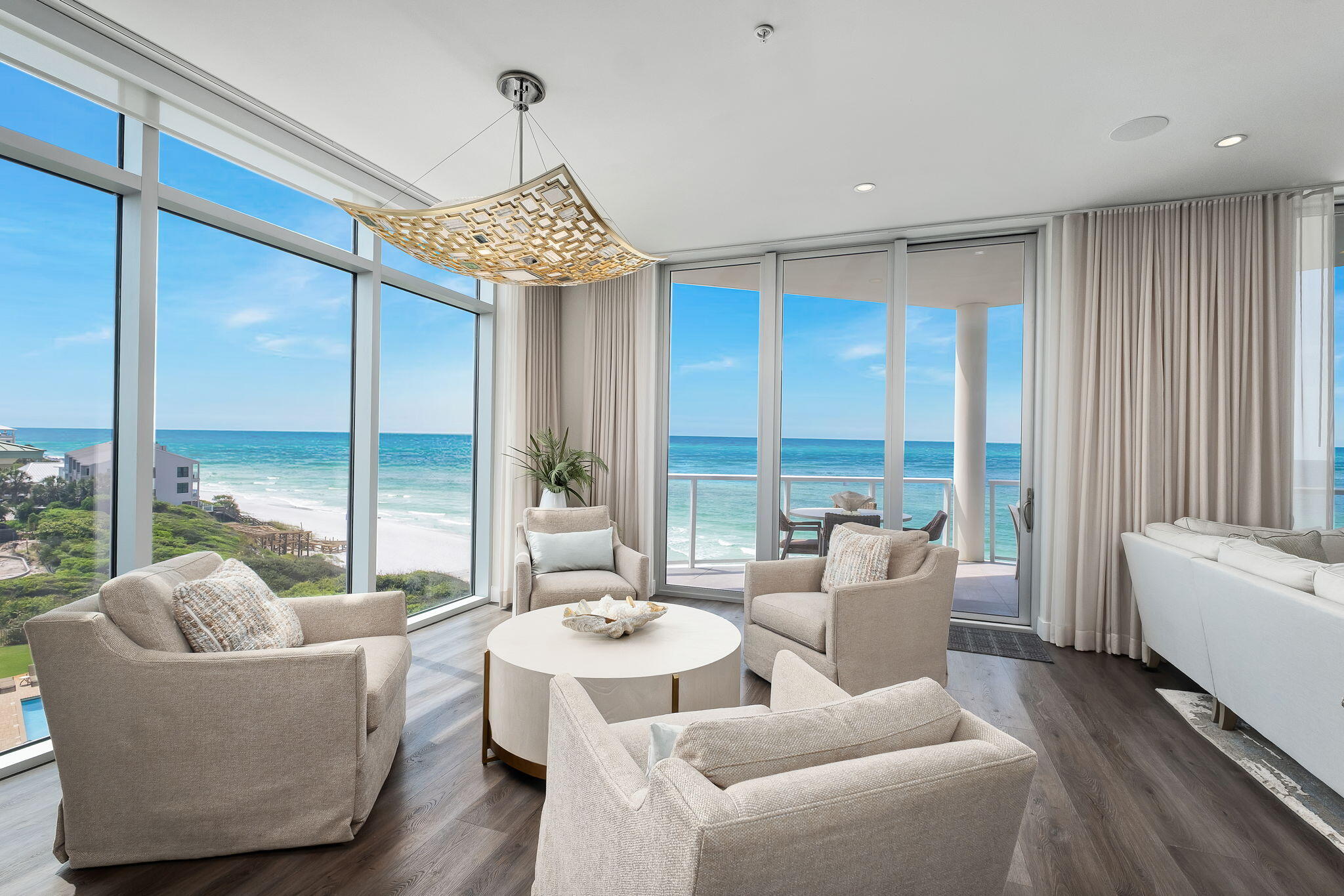 Experience refined Gulf-front living at Thirty-One in the top floor corner property providing full panoramic views to the East & West. This 3BR+office, 3.5BA residence offers 2,855 sqft of completely customized coastal design with the furnishings included. This condo features an open-concept layout, private elevator entry, Gulf-facing bedrooms, terrace & balcony. Other high-end upgrades include heated marble floors in the master bath, motorized shades, custom cabinetry throughout & two additional refrigerator drawers in the kitchen paired with the SubZero & Wolf appliances. Come see this non-rental development in the heart of 30A with 3.92 acres & 335' of beach frontage shared by 27 residences. Amenities include an enlarged pool, beach chair service, dedicated garage parking & storage, fitness center & owners lounge.