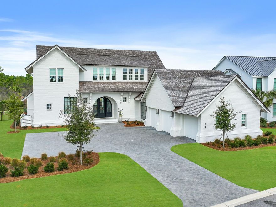 Thoughtfully designed by Greg Jazayeri, expertly built by Regal Stephens, and exquisitely finished and furnished by Tracery Interiors, this four-bedroom, five-and-a-half-bath custom home in Watersound Camp Creek embodies craftsmanship at its highest level. From the moment you enter, every detail reflects artistry and intention -- from the coral stone floors that flow seamlessly indoors and out to the natural marble and quartzite countertops and handcrafted Grimes cabinetry.The primary suite is located on the main level, creating an easy rhythm between private retreat and open gathering space. Expansive sliders blur the line between the living room and the outdoor entertaining area, where dual grills, a spa, and a cabana with pool table set the tone for relaxed sophistication. Distinctive architectural features include all-brick construction with custom Hardie accents, a wood shingle roof, eight Bevolo gas lanterns, and custom steel windows and doors that flood the home with natural light.

Designed for effortless entertaining, the kitchen offers two Sub-Zero refrigerators, three dishwashers, two ice makers, and a wine and beverage center. Nearly $500,000 in furnishings, electronics, and custom window treatments are included, creating a turnkey experience that is as luxurious as it is livable.

Ownership at Watersound Camp Creek includes exclusive Watersound Club membership, granting access to three premier properties  Camp Creek, the Beach Club, and Shark's Tooth  featuring world-class golf, dining, fitness, pools, beach access, and racquet sports. This residence represents a rare opportunity to own one of the only custom-built homes in Watersound Camp Creek, an architect-led masterpiece offering both refined design and the full privileges of an exceptional coastal lifestyle.