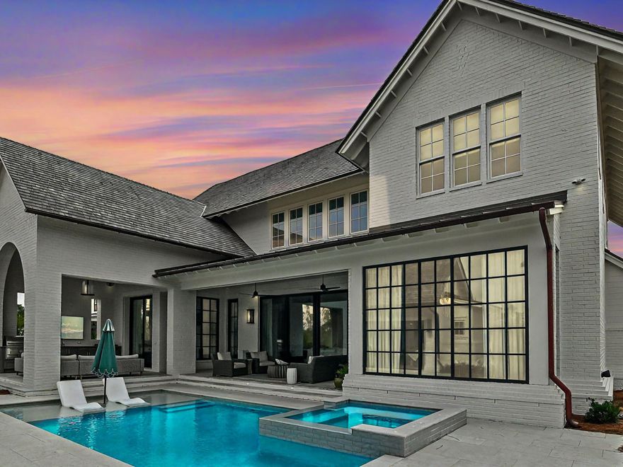 Thoughtfully designed by Greg Jazayeri, expertly built by Regal Stephens, and exquisitely finished and furnished by Tracery Interiors, this four-bedroom, five-and-a-half-bath custom home in Watersound Camp Creek embodies craftsmanship at its highest level. From the moment you enter, every detail reflects artistry and intention -- from the coral stone floors that flow seamlessly indoors and out to the natural marble and quartzite countertops and handcrafted Grimes cabinetry.The primary suite is located on the main level, creating an easy rhythm between private retreat and open gathering space. Expansive sliders blur the line between the living room and the outdoor entertaining area, where dual grills, a spa, and a cabana with pool table set the tone for relaxed sophistication. Distinctive architectural features include all-brick construction with custom Hardie accents, a wood shingle roof, eight Bevolo gas lanterns, and custom steel windows and doors that flood the home with natural light.

Designed for effortless entertaining, the kitchen offers two Sub-Zero refrigerators, three dishwashers, two ice makers, and a wine and beverage center. Nearly $500,000 in furnishings, electronics, and custom window treatments are included, creating a turnkey experience that is as luxurious as it is livable.

Ownership at Watersound Camp Creek includes exclusive Watersound Club membership, granting access to three premier properties  Camp Creek, the Beach Club, and Shark's Tooth  featuring world-class golf, dining, fitness, pools, beach access, and racquet sports. This residence represents a rare opportunity to own one of the only custom-built homes in Watersound Camp Creek, an architect-led masterpiece offering both refined design and the full privileges of an exceptional coastal lifestyle.