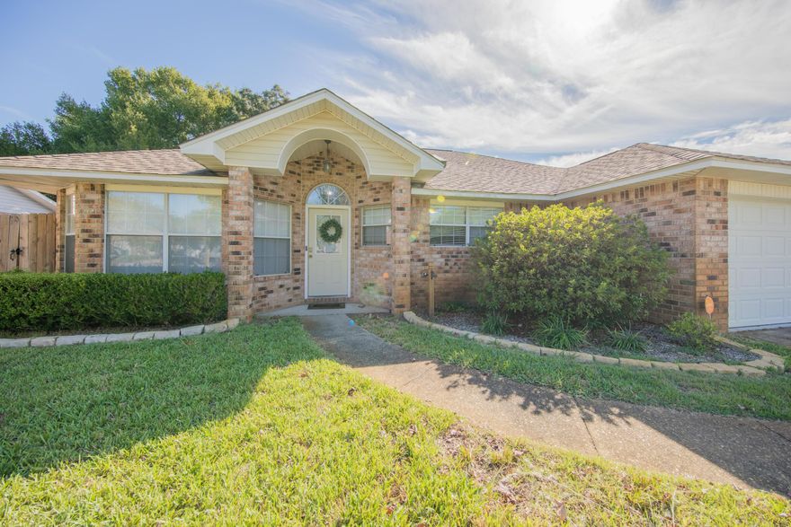 Charming 3 bedroom, 2 bath home in Legend Cove, located on the south side of 98. Home does have an extra room that could be an office or play room. The home is very open and features a split floor plan along with a Florida room, fireplace and a huge backyard. Come check it out!