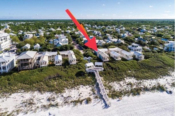 Located south of 30A and just steps to the East Ruskin Pavilion, this two-story cottage offers an exceptional location with terrific gulf views. The interior of the cottage was remodeled to create two master suites and a third guest bedroom, each with private baths. On the second level generous windows from floor to ceiling in the living area fill the room with natural light and sunset views. The adjoining porch extends the living area to the outdoors and overlooks the emerald waters of the gulf and the quaint Seaside honeymoon cottages. The open kitchen has been updated with new cabinetry, stainless steel appliances, gas range and Vetrazzo (recycled sea glass) .