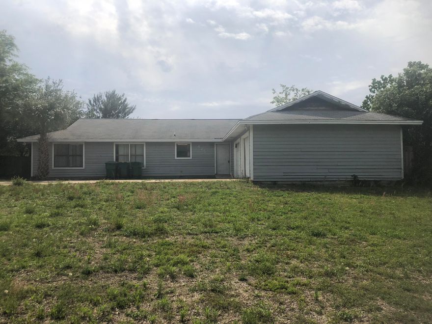 Right in the heart of Destin, this house on a huge, gorgeous, third of an acre lot is available for you to make your own! It will need a complete rehab, all the way down to the studs, likely, and it is being offered completely as it is. The only financing that will work is some type of Renovation Loan, but man! The floor plan is great, and this house could be an absolutely beautiful home. All it needs is you!