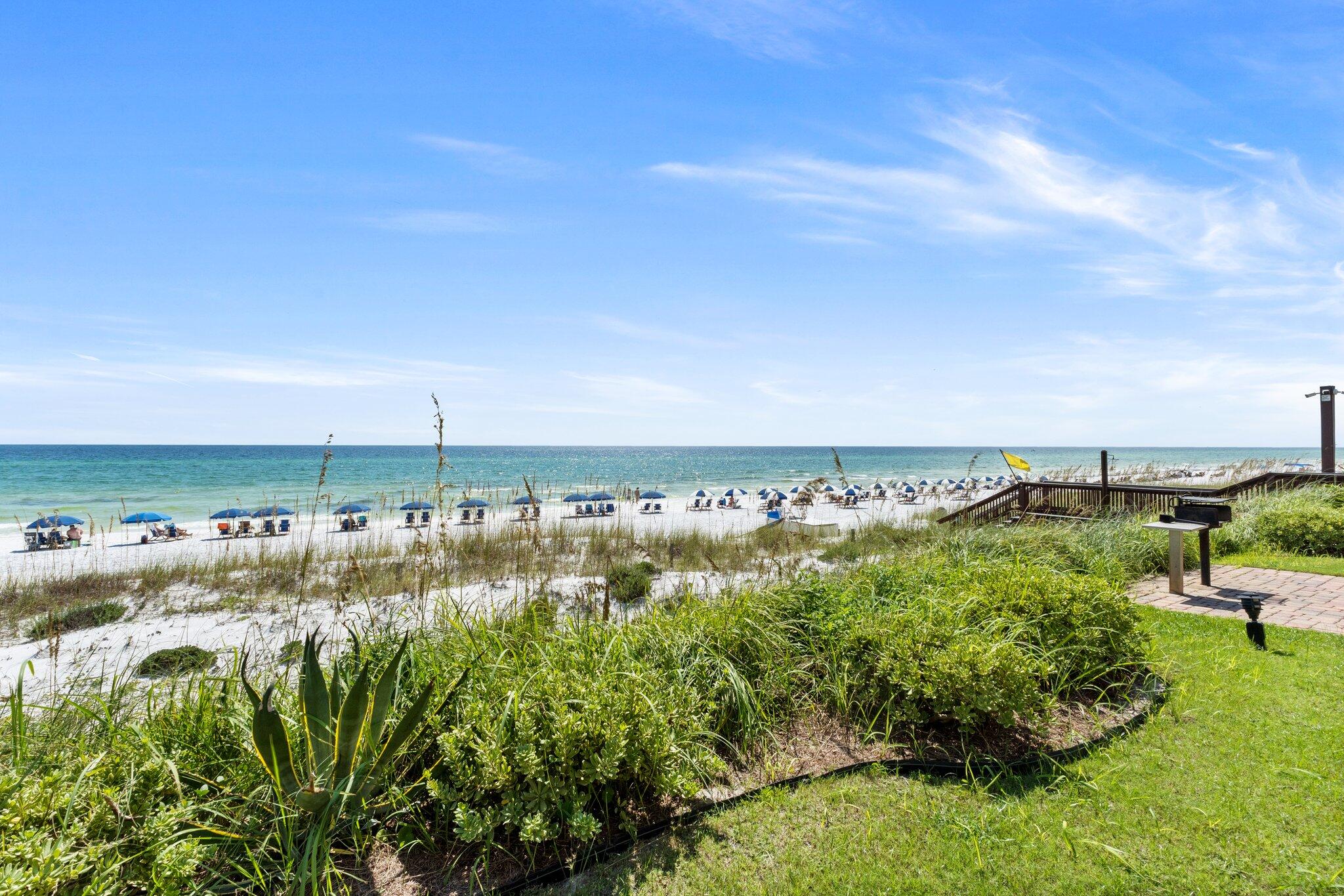 This stunning beachfront condo offers an unbeatable location beside the renowned Henderson Park Inn, at the western end of Scenic Highway 98. Escape to the peaceful shores of the Emerald Coast, where you enjoy quiet, private beaches, and the serenity of uncrowded sands. With restaurants within walking distance and some of the areas best shopping just minutes away, Coral Reef is the perfect spot to create lasting beachside memories.This charming ground-floor condo comfortably accommodates up to six guests and has beenthoughtfully updated with modern amenities. The kitchen boasts granite countertops, stainless steel appliances, and a double-bowl sink, while a brand-new washer and dryer add convenience to your stay. The open-concept living and dining area is beautifully decorated and features a 55" smart TV, crown molding, and stunning ocean views that will enhance your morning coffee or
afternoon relaxation.

Upon entering, you'll find the master bedroom to the left, complete with a cozy king-sized bed, an en-suite bathroom, and a utility area housing the new stacked washer and dryer. Across the hallway, there's a convenient half-bath for guests. For the little ones, a twin-over-twin bunk bed is cleverly tucked into the hallway, providing a fun and comfortable space for them to rest.

The living area opens up to breathtaking views of the Emerald Coast's sparkling waters. Whether you're lounging inside or stepping outside for a closer look, the sights and sounds of the ocean are always within reach.

Coral Reef  is ideally situated close to all that Destin has to offer. Enjoy a leisurely stroll to some of Destin's finest restaurants or take a short drive to explore the Destin Harbor, championship golf courses, and family-friendly activities. Shopping is also just blocks away, making it easy to explore everything this vibrant coastal town has to offer.