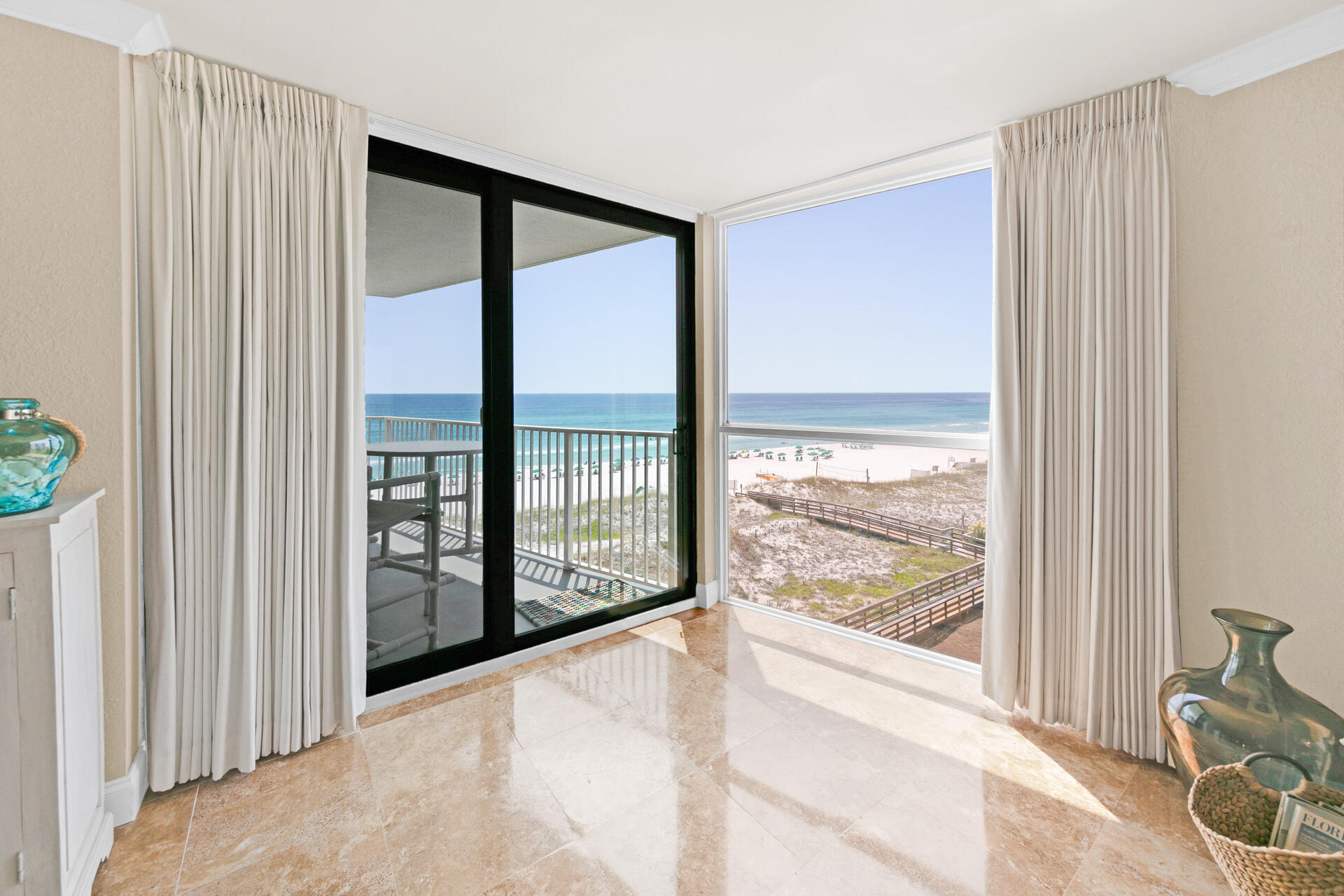 This beautifully renovated 4th floor condo is located in the highly sought after building 1 of Mainsail Resort. Come see this spacious 2 bedroom, 2 bath beach side condo, on the east side of Mainsail Resort in the building nearest the gulf. This condo offers a spectacular panoramic view of the beach and gulf. The master bedroom has direct access to the balcony and the same incredible gulf view. This condo's location and design will make it a great beach rental or primary residence. Some recent updates include new Trane AC in Aug 2021, Quartz counters in Kitchen, bathrooms and bar area, custom closet organizers in bedrooms, new refrigerator and dishwasher and hurricane sliding doors. Mainsail's amenities include 24 hr. security, exercise room, pool, hot tub, grills, tennis courts, club room, tons of covered parking and more!