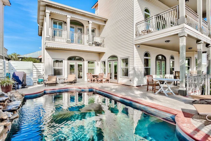 Beautiful gulf views from every single level of this home, including the first! Perfectly positioned on Scenic Highway 98 in Crystal Beach. This 5 bedroom and 5 bathroom large luxury beach estate is a unique, income producing second home with an exceptional number of parking spots and close proximity to the beach. Both the stylish outdoor oasis with a large pool area and the open-concept interior, makes this home an ideal property for entertaining all your guests. Notice the level of detail throughout this home from vaulted ceilings in the master bedroom to the exquisite crown molding. The custom converted garage serves as a one-of-a-kind game room/bedroom with craftsman style bunk beds which can be appreciated by guests of all ages. Rental projections exceed $220,000.