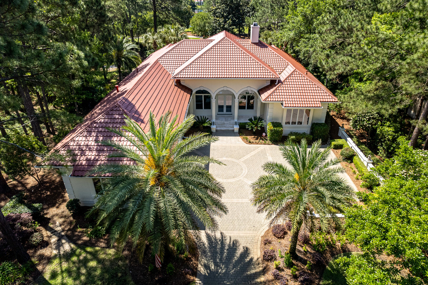 New Price! Golf course living, peaceful sounds of a waterfall, a private backyard oasis and quality craftsmanship is what 1545 Baytowne Avenue offers. This stately home sits on the Raven golf course and boasts 12' and 14' ceilings throughout, large living spaces and a split bedroom floorplan. The back porch and pool deck has retractable screens, a gas fire pit and plenty of seating for entertainment. In 2021 this home received a new roof, exterior paint and new insulation making this home the tranquil space you've been looking for. The interior was just painted as well. Call me for a list of features and amenities or ask your favorite agent to schedule your private viewing today.