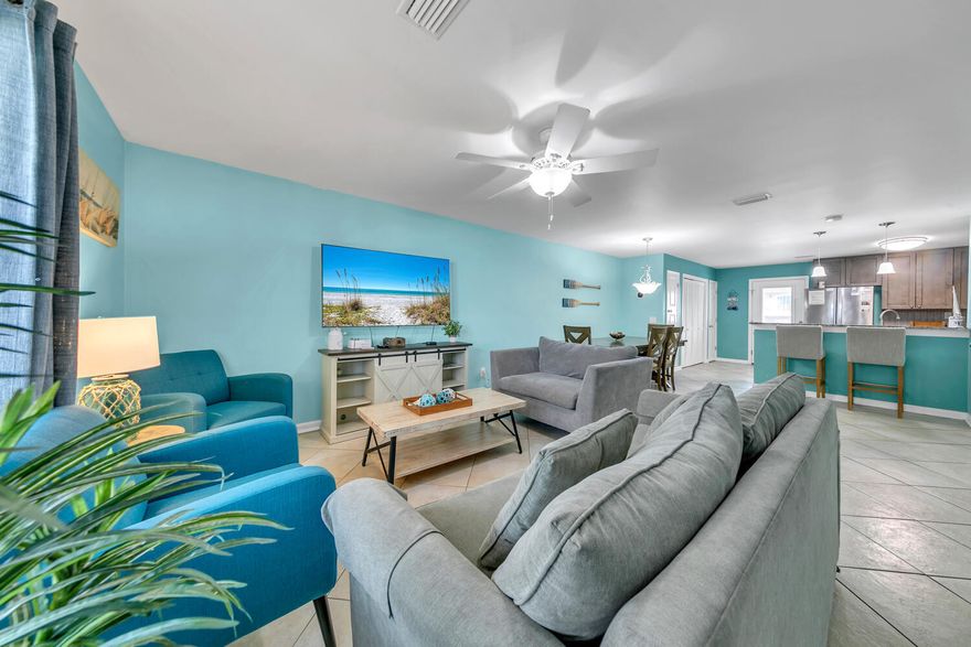 This stunning townhome is just a 2-block walk from the pristine sands and picturesque beaches of Miramar Beach! Recently remodeled to perfection, this immaculate unit offers everything you could wish for, whether you're looking for a short-term getaway or a primary residence. The extensive renovation includes updated ceilings, a modern kitchen with granite countertops and new appliances, a new water heater, ceiling fans, and an efficient A/C unit--all brand new. Enjoy the convenience of assigned parking and proximity to the renowned Pompano Joe's restaurant. Plus, you're just steps away from the heated community pool and recreational facilities. Don't miss the chance to see this exceptional property--you won't be disappointed!