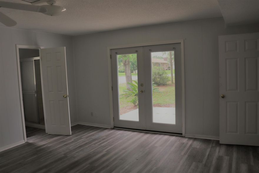 These Sellers have done quite a bit of ''updating'' since purchasing the home. From NEW ROOF LAST MONTH !! To NEW PAINTING THROUGHOUT AND NEW FLOORING THROUGHOUT !!! PLUS TWO NEW HOT WATER HEATERS IN LAST COUPLE YEARS -ONE IS ELECTRIC AND THE OTHER IS GAS.. NEW DISHWASHER !! AND 2 YR TERMITE TREATMENT. WOOD BURNING FIREPLACE IN LARGE LIVING ROOM. You can use the large kitchen as ''eat-in'' or Dining room in next room. There is a backyard building with almost completed room for toys, exercising or whatever!! PLENTY OF PARKING. DO NOT MISS THE OUTSIDE COURTYARD RIGHT OUTSIDE THE MASTER AND THE LIVING ROOM.