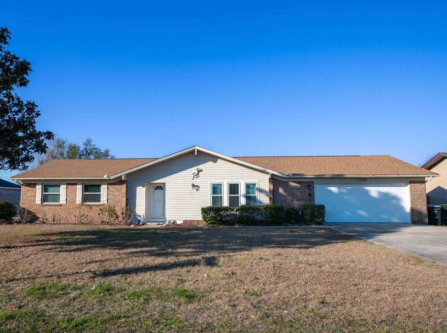 Conveniently located 5 minutes from NAS Pensacola, 15 minutes from the beaches of Perdido Key & Orange Beach and just a short walk to Grande Lagoon, 5 mins to Johnson Beach, & community has private beach with dock & boat launch. Large 1/3 acre in North Grande Lagoon community Updated 3 bedroom, 2 bath ranch with a large 2 car garage on a dead end street. Backyard has newer privacy fence, sprinkler system on well. New roof 2020,  impact windows, new garage door with opener. Updated bathrooms, new electric copper wiring including hard wire hookup for generator, new water heater & hvac.  All exterior doors are new including french doors with blinds. New wood burning fireplace. Tile & Luxury Vinyl Plank throughout house. Updated kitchen with 42 inch soft-close, stainless steel appliances