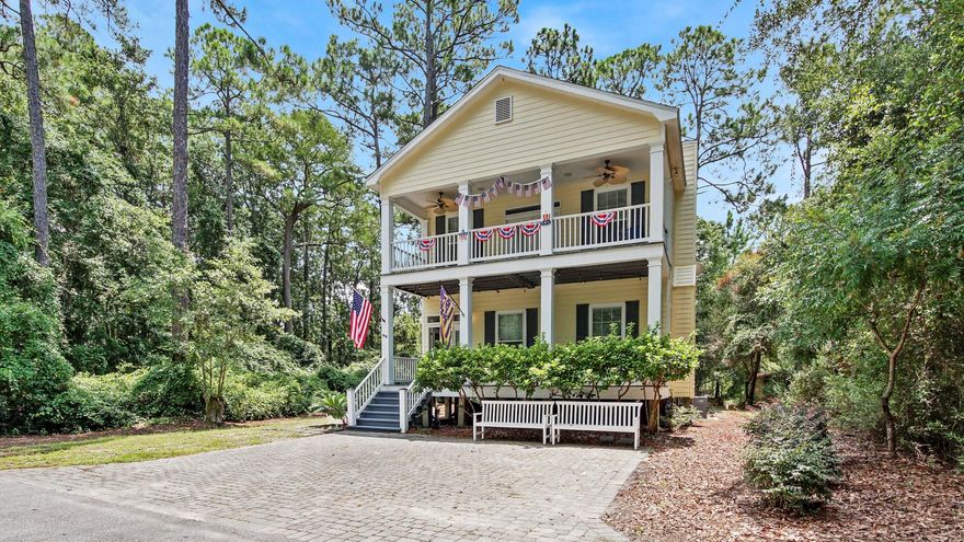 This beautiful 3 bedroom/2.5 bath Florida Cottage home is nestled on a quiet street with lots of privacy. The spacious floor plan gives you ample space to entertain or just enjoy the Florida Lifestyle.  Large covered porches on both floors adorn this home with a nice deck on back for grilling and serving your favorite meals.  Beautiful hardwood floors flow throughout the bottom floor and stair case.  Large master suite, with oversized master bath with garden tub and separate standup shower, are on the 2nd floor along with the other two spacious guest rooms and guest bath.  Open style kitchen has a breakfast bar with plenty of storage, and the dining area also has a built-in bar area. Home is being sold furnished and ready to move in, or would make a great investment property.