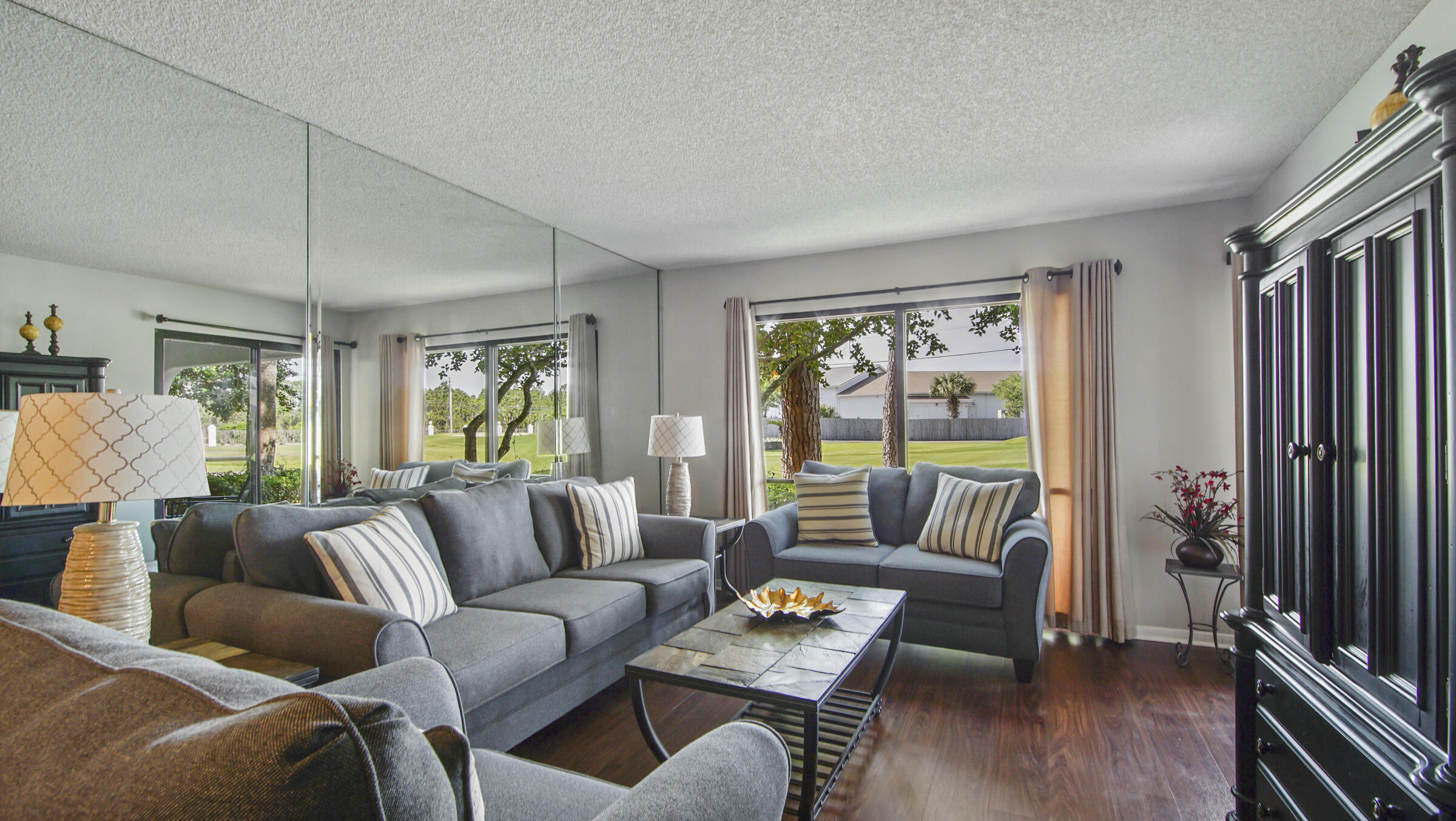 Welcome to your new beach home at the Edgewater Beach Resort. This golf villa is located on the ground floor, with your backyard patio overlooking the nine-hole executive golf course. If you want serenity after a day at the beach, walk into this peaceful condo, step outside on your patio, and relax. Golf Villa 2002 has been freshly painted, with all new furniture and a newer water heater. This beach home would be perfect for your primary or second vacation home. Enjoy true resort amenities with golf, tennis, pickle ball, heated pools, and beach access that no other resort features in Panama City Beach.