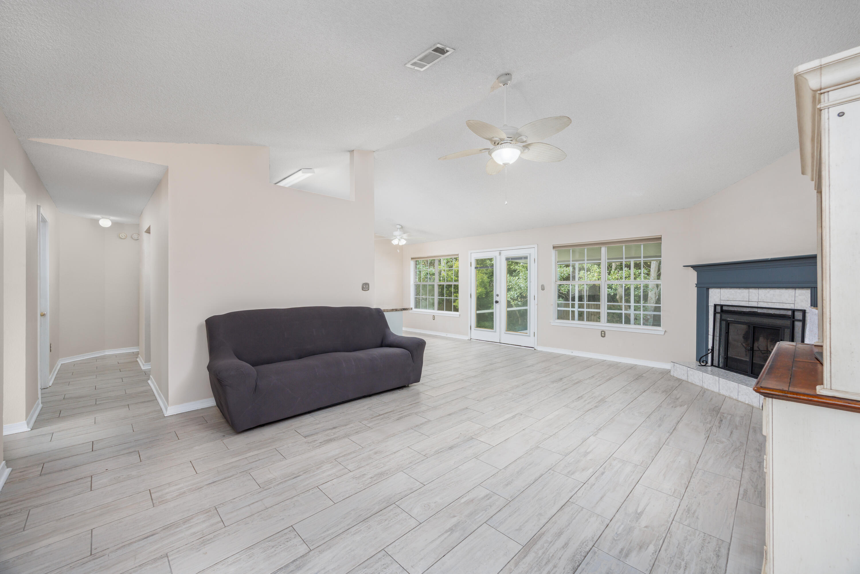 Discover the perfect blend of comfort and coastal living in this beautifully updated 4 bedroom, 2 full bath, single-story home in Gulf Breeze featuring a desirable split floor plan.Inside you'll find an open-concept kitchen with generous counter space, updated cabinetry, and a seamless flow into the living and dining areas, ideal for gatherings and everyday living.The spacious primary suite is thoughtfully separated from the guest bedrooms, offering privacy for the whole family. Tile flooring throughout the main living areas provides a clean, modern look and easy maintenance. Step outside to a screened patio overlooking a fenced backyard, perfect for morning coffee, weekend barbecues, or simply relaxing in your private outdoor retreat. Located just minutes from multiple boat ramps including Shoreline Park and Bal Alex, you'll enjoy convenient access to the Santa Rosa Sound for boating, fishing, and watersports.
Other attractions such as the 50-acre Gulf Breeze Zoo are just a short drive away, and the brand-new Soundside High School (school district to be confirmed), scheduled to open Fall 2026, adds incredible value to the community. This move-in ready home offers the best of Gulf Breeze living with nearby beaches, boating, and top-rated schools, all in a peaceful neighborhood setting. Don't miss the chance to make this your new home.