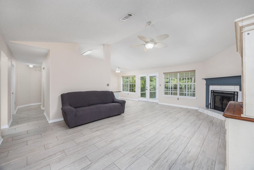 Discover the perfect blend of comfort and coastal living in this beautifully updated 4 bedroom, 3 full bath, single-story home in Gulf Breeze featuring a desirable split floor plan.Inside you'll find an open-concept kitchen with generous counter space, updated cabinetry, and a seamless flow into the living and dining areas, ideal for gatherings and everyday living.The spacious primary suite is thoughtfully separated from the guest bedrooms, offering privacy for the whole family. Tile flooring throughout the main living areas provides a clean, modern look and easy maintenance. Step outside to a screened patio overlooking a fenced backyard, perfect for morning coffee, weekend barbecues, or simply relaxing in your private outdoor retreat. Located just minutes from multiple boat ramps including Shoreline Park and Bal Alex, you'll enjoy convenient access to the Santa Rosa Sound for boating, fishing, and watersports.

Other attractions such as the 50-acre Gulf Breeze Zoo are just a short drive away, and the brand-new Soundside High School (school district to be confirmed), scheduled to open Fall 2026, adds incredible value to the community. This move-in ready home offers the best of Gulf Breeze living with nearby beaches, boating, and top-rated schools, all in a peaceful neighborhood setting. Don't miss the chance to make this your new home.