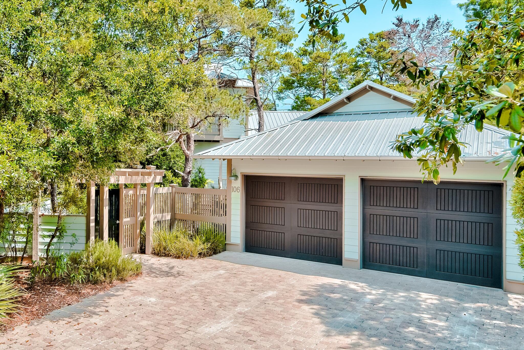 An immaculate custom built home with beautiful indoor & outdoor entertaining areas in a gated community just a quick walk or bike ride away from the spectacular beaches of South Walton via a dedicated bike/walking path! Summer Ridge South is a beautiful tree-lined community of custom coastal cottage homes located just .7 miles from the beach, restaurants and shopping of Gulf Place home of Shunk Gulley Oyster Bar, The Perfect Pig, Pizza by the Sea and Sunrise Coffee Co. You enter the home through the natural outdoor living area and step into the spacious great room with soaring vaulted wood ceilings, hardwood floors and built in entertainment center. Windows & transoms surround the room allowing in plenty of natural
