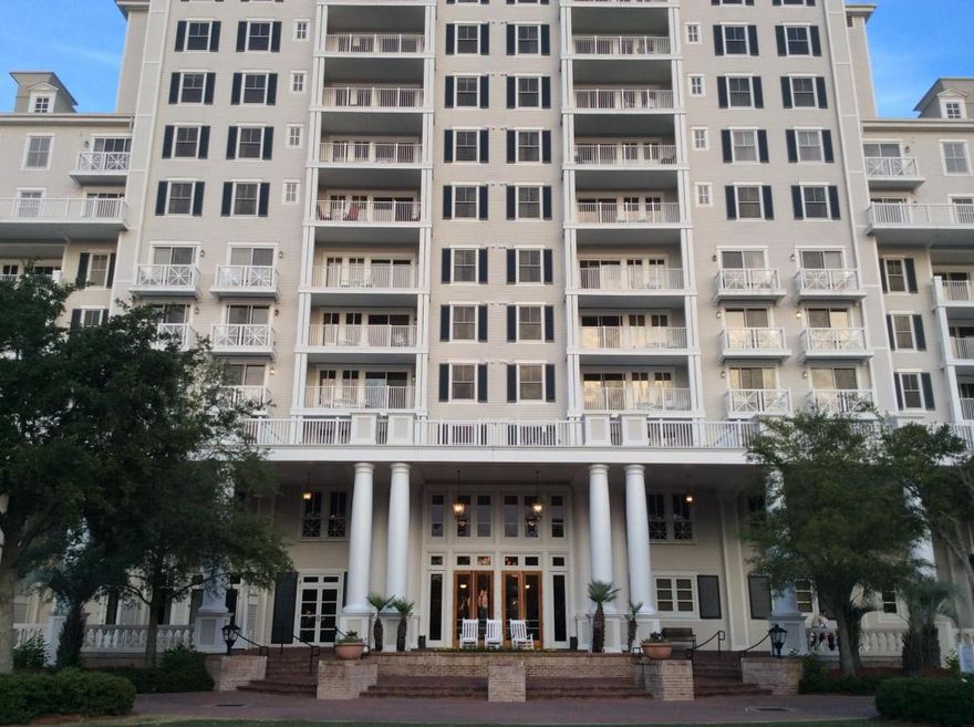 Southern charm and elegance exceed expectations from the moment you arrive. Gracious porches, columns, shutters & rocking chairs give introduction to the pristine lobby area, complete with fireplace, marble flooring, and grand piano. Now enter through mahogany double doors to #2805 and be delighted with its updated modern decor, beautiful all-tile flooring,shuttered door and windows, crown molding, and many personal touches that create a turn key condo. With its high rating, this condo has an AWESOME RENTAL HISTORY. Relax on the deck for great views of the golf course extending out to the Bay, or take the Brick walkway a few yards to all the fun, dining, and shopping offered at Baytowne Wharf. Visit and be impressed!