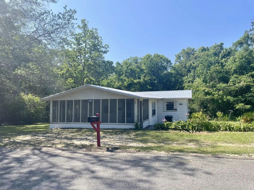 Calling all investors!!! Here is an opportunity to finish out a home and make it yours! Brand new metal roof! Three bedrooms and one bathroom with an over-sized living room and front porch all on a corner lot in city limits! This home is located a mile from our Historic downtown area, Lake DeFuniak and just over 30 minutes to the Emerald Coast! .
