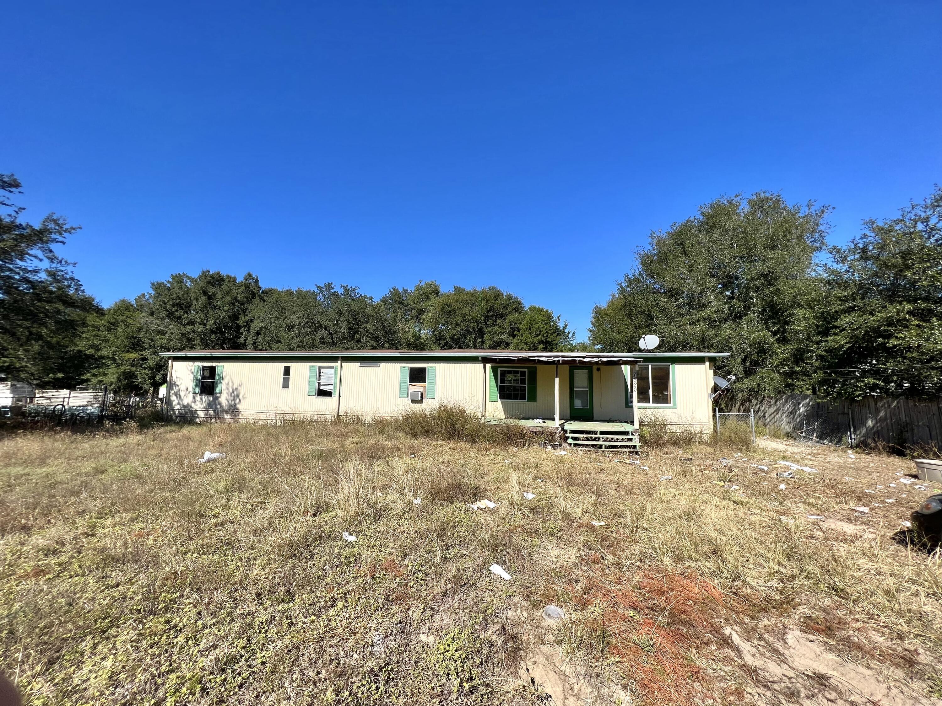 Tons of potential with this property! This 3 bedroom 2 bathroom mobile home has plenty of opportunities including fixing it up to live in, potential rental income property, or build new! Being sold AS-IS, buyer to verify all measurements.