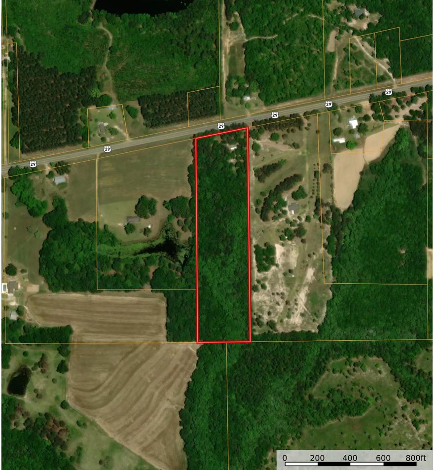 Beautiful and fully wooded 9+/- acre parcel on US Hwy 29 south of Andalusia! Ideal for building a home or cabin with plenty of privacy as the property adjoins Conecuh National Forest at the south boundary line. Mature timber throughout the parcel with a gentle roll from north to south as you move away from the highway. The parcel does have power, private well and septic system in place along with a few structures but no value is given to the structures. If you've been looking for a little place to get away, this could be the one for you!