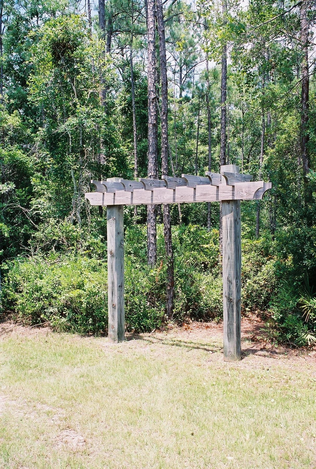 Serene & wooded waterview lot on Choctawhatchee Bay is .97 acres. An observation platform is in place so you can easily see the water view from your home when constructed. The WOODS is a carefully planned neighborhood with a community dock, community park with amenities. It is minutes from the beaches, dining and entertainment. There is no build out period and the architectural guidelines and covenants can easily be emailed . ***WATER/SEWER TAP FEES ARE PAID.Recent Wetland Delineation completed. Area for building a structure has increased dramatically from .57 to .87.Price reduced to $340,000 for purchasing both lots 21 and 22. Total 1.78 acres