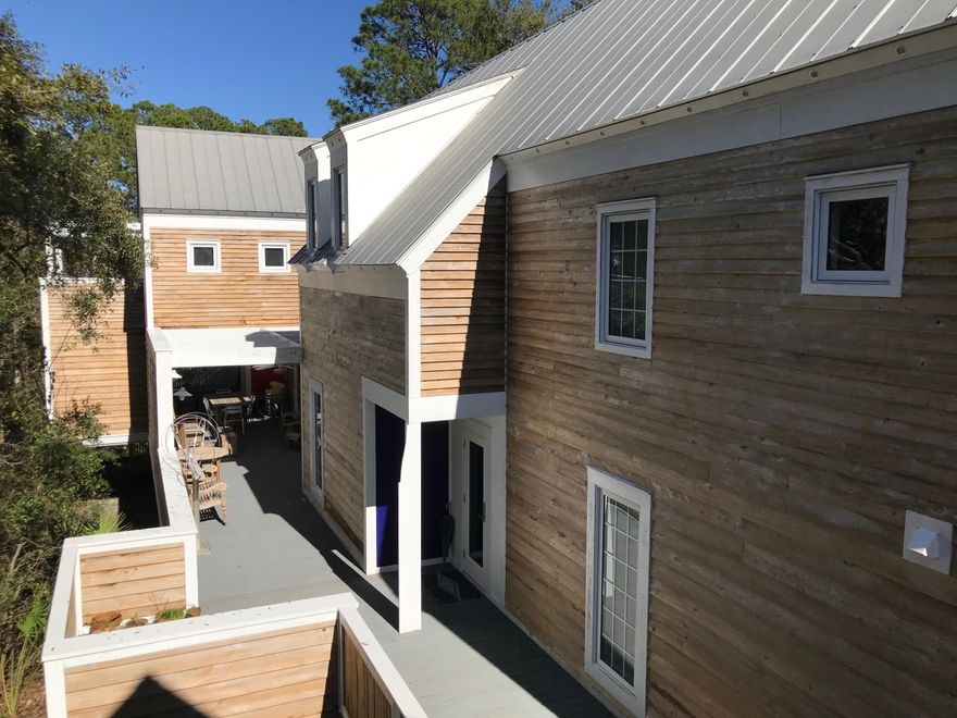 A Canal front home with main house/carriage house located in 'Old Seagrove'.  Local's call it 'Old Seagrove' because it was built first, before famous Seaside. This area has beautiful, winding, tree lined streets. You are located only a few blocks from ocean and this area has no active HOA.  No HOA fee's and also means you have more freedom to enjoy your beach house and all the bikes, boats and toys you want.  Seagrove Beach has plenty of close and easy beach walkovers.  There are numerous restaurants and boutiques a short walk or golf cart ride away. Want to take an eco-adventure?  This house is located on the original 1940's canal. The canal leads to one of South Walton's rare Coastal Dune Lake's called Western Lake. Western Lake leads directly to Grayton Beach. Property to be sold AS IS