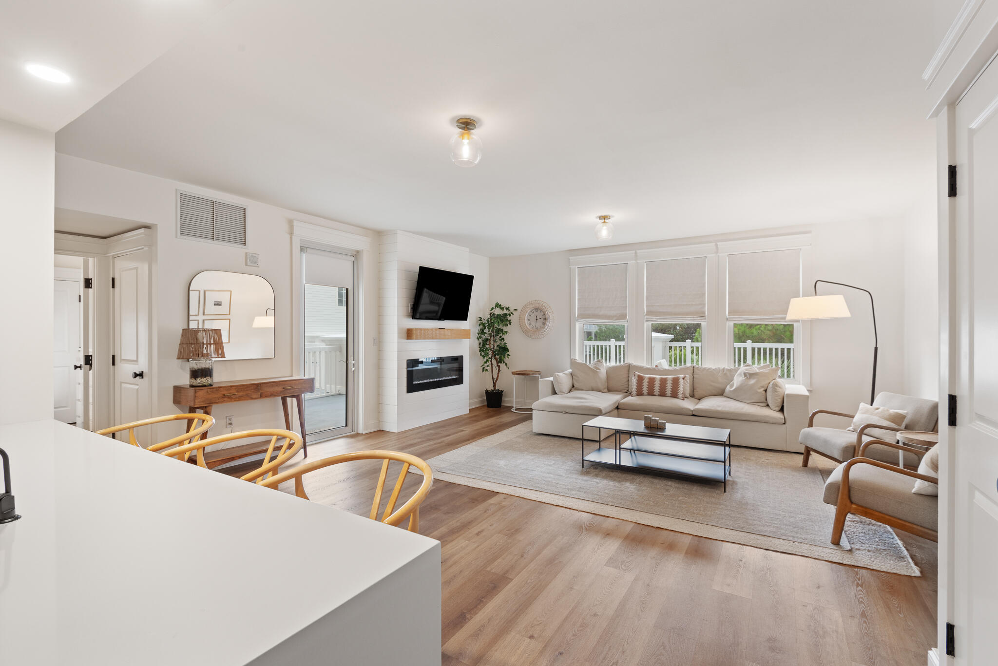 Gorgeous 1BR/1BA corner residence in the coveted Grand Sandestin condominium of the Sandestin Golf and Beach Resort only moments from the lively Village of Baytowne Wharf with shopping, dining, and activities. This exquisite condo boasts a recently renovated interior and is offered move-in ready with high-end furnishings reflecting both sophistication and comfort. The highlight of this stunning residence is its expansive 840 sq ft private wrap-around terrace, providing beautiful views of the landscaped grounds. Enjoy clean lines throughout with a peaceful aesthetic of white walls, light toned hardwood floors, and a neutral color palette. Laundry is a cinch with the in-unit washer & dryer. The custom-designed kitchen features solid surface countertops, stainless-steel appliances, and a breakfast bar with ample seating making it a chef's delight. The bedroom is a serene retreat while the bathroom features a shiplap accent wall, an elegant dual vanity with gold fixtures, and a tiled surround on the bathtub/shower combo. In the living area, you'll find a hidden built-in desk in the closet with a solid wood surface and leaf sconce, perfect for working or computer access. Owners also have access to a storage unit in the parking garage. Embrace the luxurious lifestyle and unparalleled amenities offered by this extraordinary coastal sanctuary.
The Sandestin Golf and Beach Resort is a 2,400-acre gated property bordering the gulf and the bay. Residents can enjoy an exciting array of activities such as championship golf courses, world class tennis facilities, swimming pools, a fitness center, a 113-slip marina, the Baytowne Wharf dining and entertainment complex, and Grand Boulevard Town Center with boutique shops, restaurants, a movie theater, and a Publix grocery store, all interconnected by miles of pedestrian and golf cart paths.