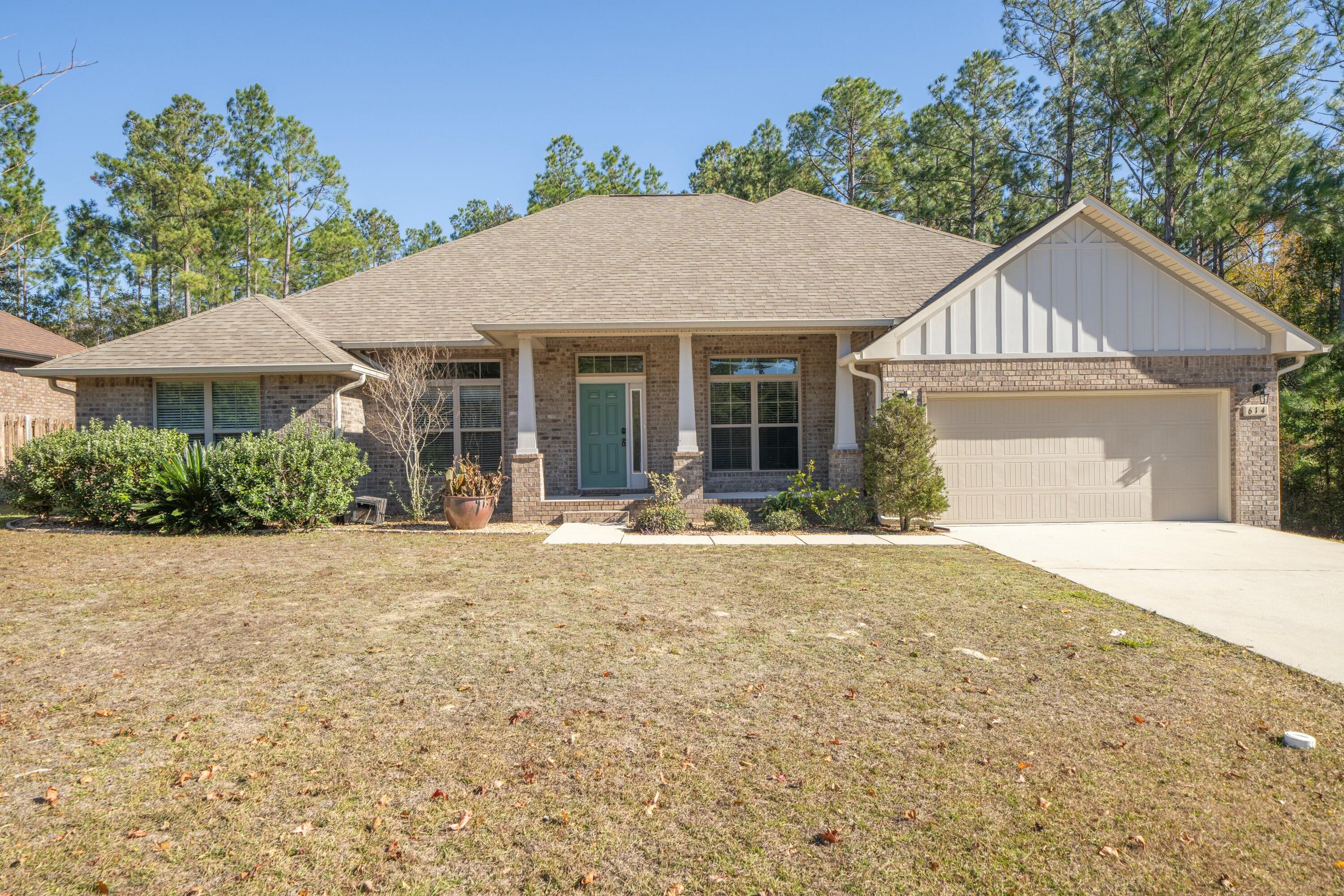 Welcome to 614 Terrier Trail, Crestview, FL--a home that perfectly blends comfort, style, and convenience. Situated at the end of the subdivision on a dead end street, in a peaceful neighborhood, this property offers everything you've been looking for.Inside you will discover a spacious open-concept floor plan filled with natural light. The modern kitchen features sleek countertops, stainless steel appliances, and plenty of cabinet space, making it a true centerpiece for entertaining and daily living. The living and dining areas flow effortlessly, providing a perfect setting for hosting gatherings or relaxing after a long day. The home boasts generously sized bedrooms, including a luxurious master suite complete with a walk-in closet and a private ensuite bathroom for your personal retreat. The additional bedrooms are versatile and can be used as guest rooms, an office, or a hobby space. Outside, the backyard provides plenty of space for outdoor activities or simply enjoying Florida's beautiful weather. Located just minutes from shopping, dining, and top-rated schools, with convenient access to major highways, this home combines tranquility with accessibility. Don't miss outschedule your private showing today and make 614 Terrier Trail your new address!