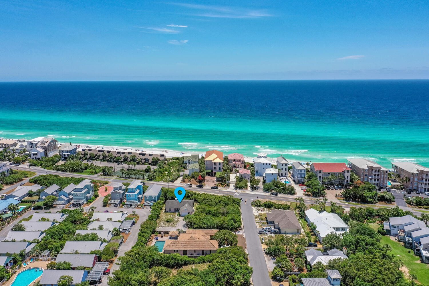 A very special location on 30A approximately 1/2 mile West of Alys Beach with deeded beach access. 3 bedrooms, 2 baths with a two car garage previously a workshop/game room/art studio. Light and bright dining room can seat 8. Cozy fireplace in the living room. Four sets of French Doors lead out to a 49'x10' covered screened lanai with plenty of room for dining and entertaining while enjoying the Gulf Breezes. Ample storage in every room, an outdoor shower, and plenty of room to add a gorgeous resort sized pool. A beautiful Magnolia tree sits in the front yard while the perimeter of the lot is surrounded with natural vegetation for the birds and butterflies to enjoy. Very serene setting, No HOA. So much potential!