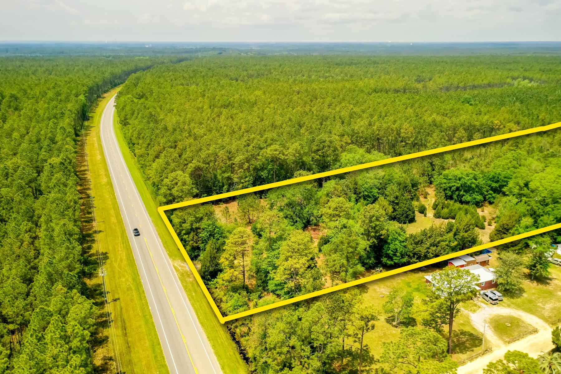 This expansive parcel is in flourishing Walton County, Florida, along Highway 20 just 1.8 miles East from the intersection at Highway 331; offering convenient access to the strongly emerging market of Freeport, but also the peripheral markets along the Coast including Santa Rosa Beach and Bay County. St. Joe's Bay Walton Sector Plan will be an enormous economic engine for the subject area. Interstate 10 is approximately 20 minutes from the subject parcel. The lot is currently zoned residential through Walton County, with likely potential for future mixed uses through the annexation into the City of Freeport, which process is currently underway. An updated survey has been uploaded to this listing under the Documents tab. Please inquire for further details.