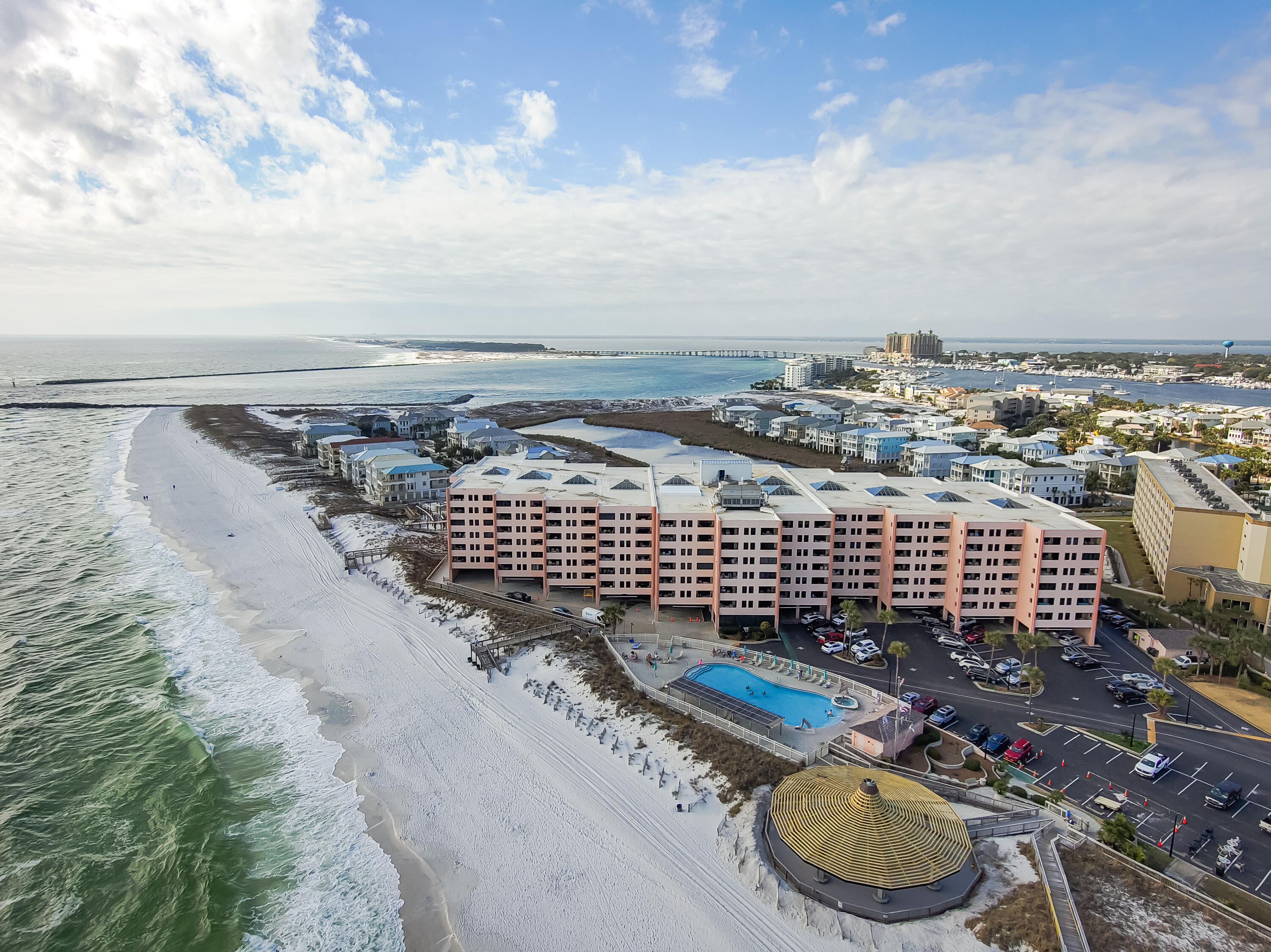 REDUCED $100,000! Complete renovation of the condo! Lowest priced 4-bedroom in a beach front building in Destin. This magnificent condo is spacious with fantastic views of the Gulf and the Destin Pass. The condo offers new flooring, paint, kitchen appliances and cabinets, quartz countertops in the kitchen and bathrooms, new fixtures, new televisions, new furniture and so much more. Jetty East is a local and renter's favorite and a staple of the Holiday Isle area in Destin. This property will make an excellent vacation rental with projected revenues between $98,000 and $108,000 per year. Big families welcome as this unit can sleep up to 10 people. Jetty East offers tennis courts, a beachside pool, large beachfront cabana for grilling or eating by the beach, pickleball courts and more.