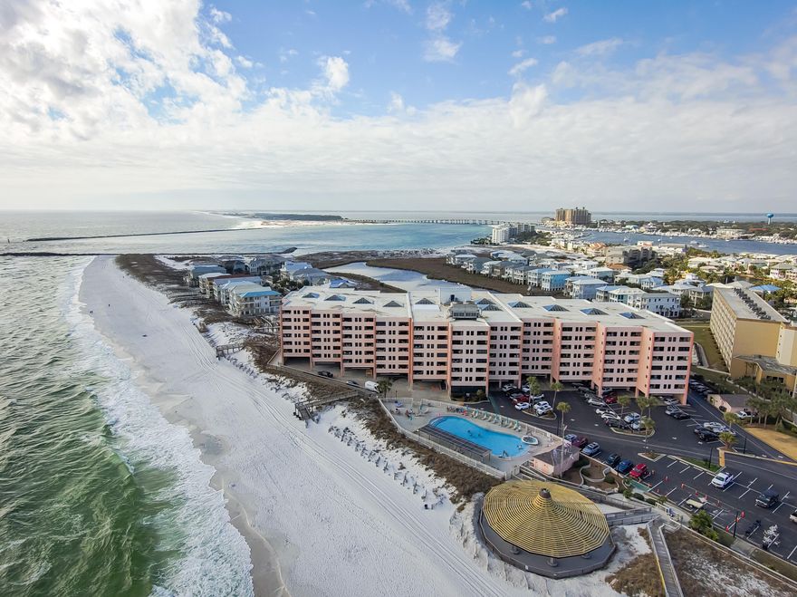 REDUCED $100,000! Complete renovation of the condo! Lowest priced 4-bedroom in a beach front building in Destin. This magnificent condo is spacious with fantastic views of the Gulf and the Destin Pass.  The condo offers new flooring, paint, kitchen appliances and cabinets, quartz countertops in the kitchen and bathrooms, new fixtures, new televisions, new furniture and so much more. Jetty East is a local and renter's favorite and a staple of the Holiday Isle area in Destin. This property will make an excellent vacation rental with projected revenues between $98,000 and $108,000 per year. Big families welcome as this unit can sleep up to 10 people. Jetty East offers tennis courts, a beachside pool, large beachfront cabana for grilling or eating by the beach, pickleball courts and more.