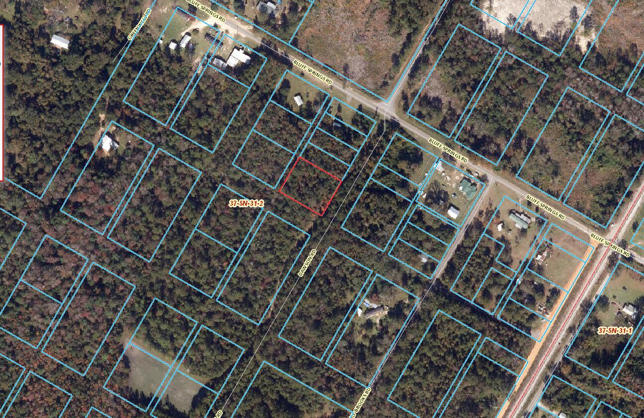 .5450 acre wooded lot. Zoned AG. You CAN have a mobile or manufactured home, SFR, or a modular home. There is a NEW cleared path / road to the lot and can be driven. The county stated, '' this road is unimproved right of way and the owner will have to get permit from county to clear and the owners are responsible for maintaining''. Bring ALL offersSEPTIC NEEDED. WATER / sewer is with Central water works