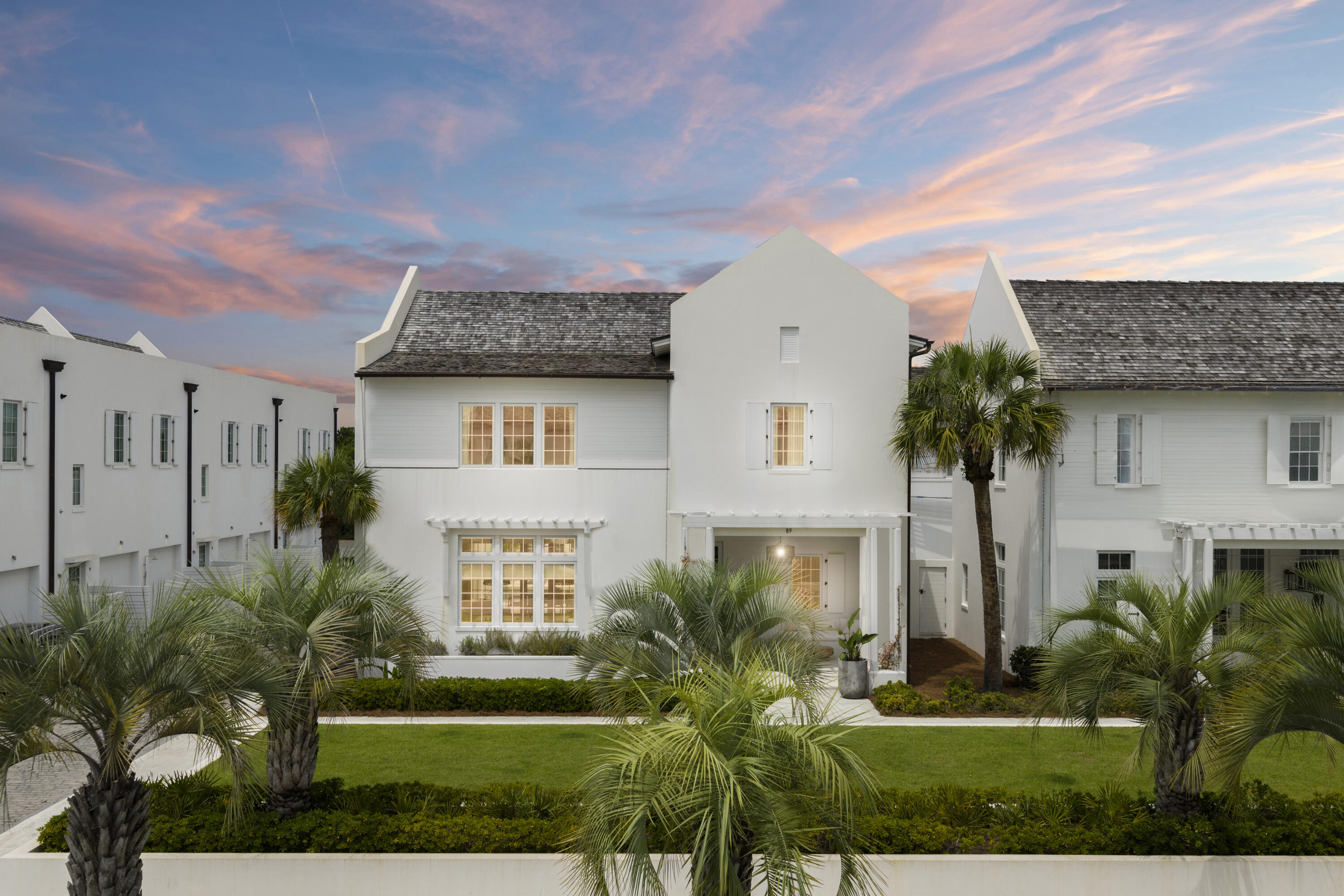 Introducing 89 Kaiya Ave, a one-of-a-kind coastal retreat located in the luxury boutique community of Kaiya Beach Resort. This thoughtfully designed Villa Seiya plan by Khoury Vogt Architects boasts 5 bedrooms and 5.5 bathrooms across 4,646 Sqft. of interior living space. Upon entering, you are greeted with the open concept dining, living room, and kitchen where natural light pours in from all directions. Full length bi-fold doors seamlessly blend the interior living space with the private outdoor courtyard complete with a fabulous outdoor cabana, generous sized pool & spa, and built-in gas grill. This floor plan offers your choice between two primary suites, one on the main level with access to the 2-car garage and courtyard. The additional primary suite is located on the 2nd level complete with a private balcony perfect for your morning coffee, and beautiful oversized marble shower. Also on the 2nd level, you will find 2 additional guest suites with adjoining media room/sleeping space, and full-sized laundry. This modern-coastal home features custom custom wood kitchen cabinetry with Caesarstone counters and backsplash, Subzero and Wolf appliances, and Waterworks plumbing fixtures throughout. Kaiya Beach Resort is a luxury boutique community with world0class amenties and a short stroll to all the shopping, dining, & infamous activities 30A has to offer.