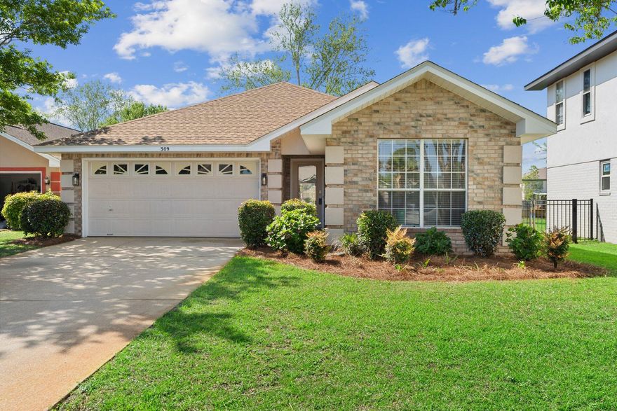 You Owe It To Yourself to See This House. Lake Front Brick Home In Gated Emerald Lakes. THE BEST PRICE Of All Homes In Neighborhood. Quiet Water View Property. Huge Primary BR Overlooking Lake & Back Yard. Primary Bathroom w/ Large Walk In Closet. LR & Dining Areas w/ Pitched 12+ ft Ceiling. Kitchen w/ Stainless Appliances Overlooks Lake Too! Two More BR's Share 2nd Full Bathroom. New Roof in 2017, Many Appliance Updates In 2024/2025 Such As: Hot Water Heater, Irrigation System, Refrigerator, Dishwasher, Garbage Disposal. New Ceiling Fans, Bathroom Plumbing Faucets + Light Fixtures, & New Carriage & Porch Lights. Two Car Garage w/ Updated Opener System. Lovely How Home Flows From Front To Back. You Can See The Lake From Front Entry. Come On Out & See For Yourself Emerald Lakes Amenity Area Has Large Swimming Pool w/ Bathrooms, A Full Playground w/ Basketball Goal, Pickleball & Tennis Courts. Neighborhood Is Centrally Located To All Destin Has To Offer. Easy Drive To World Class Dining & Shopping at Destin Commons & Silver Sands Malls. Plus Quick Access To The Beautiful Beaches Of Destin, The Bustling Destin Harbor, & The Choctawhatchee Bay For Fishing & Water Fun! You Really Would Love It Here!