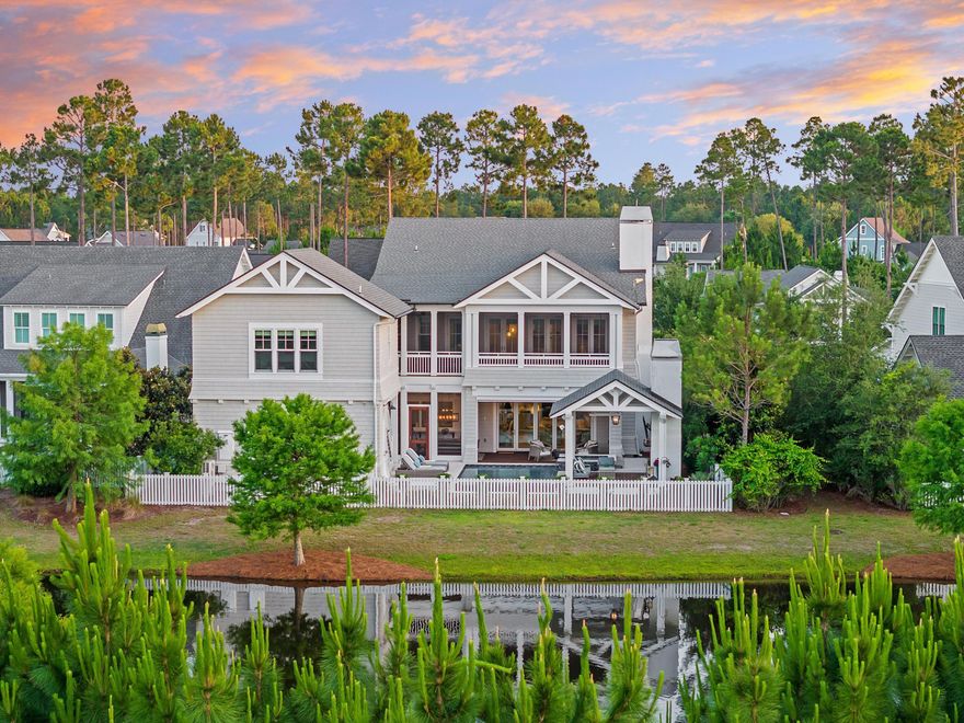 UNMATCHED LOCATION, UNFORGETTABLE HOME - Where timeless New England design meets elevated Gulf Coast living. Conceived by architect Chris Stoyles and brought to life by Turner Legacy Homes, 55 Seastone Court is the crown jewel of WaterSound Origins, offering over 4,600 square feet of custom luxury, and a private outdoor oasis--all just steps from golf, fitness, and the laid-back charm of WaterSound Origins. Set on one of the few premier custom lots in the neighborhood, this home includes a main residence, fully appointed carriage house, two car garage, private pool with spa, outdoor cabana and more. Built to impress and endure, this estate blends architectural pedigree, elevated design, and everyday comfort in one of the most desirable coastal communities in Florida. From the moment you arrive, this home makes a statement. Its classic Nantucket-inspired architecture is complemented by lush, manicured lawn and mature, professionally curated landscaping. Step through the mahogany front doors and into a world where layered elegance and coastal warmth coexist in perfect harmony. Coffered and beamed ceilings, hand-milled mahogany fireplace mantles, wide-plank hardwood flooring, and exquisite lighting from Visual Comfort and Lighting Etc. set a tone of elevated craftsmanship throughout. Natural light pours through Sierra Pacific windows, illuminating an open-concept living, dining, and kitchen area that serves as the true heart of the home. The chef's kitchen is both beautiful and brilliantly functional, anchored by custom Milano cabinetry with brass hardware, sleek quartz countertops, and a full suite of premier Wolf, Sub-Zero, and Fisher & Paykel appliances. Every detail has been consideredfrom the hidden ice maker and wine fridge to the dual wet bars and Kohler fixtures. Euro-Wall glass doors blur the line between inside and out, opening the main living space to an expansive backyard oasis that invites year-round enjoyment. The main-level primary suite is a masterclass in tranquility, featuring floor-to-ceiling windows, remote-controlled drapery, and a spa-like bath complete with Caliza stone sinks, imported fixtures, and a boutique-style custom closet. A private office, stylish powder room and expansive laundry room complete the ground floor. Upstairs, an additional primary suite awaits, along with two more en-suite bedrooms, another full laundry and a second living room with gas fireplace that can be easily transformed into a home theater or media loungeperfect for entertaining guests or relaxing with family. Beyond the main residence, a fully equipped carriage house above the garage offers a complete retreat of its own. Ideal for extended guests, multi-generational living, or a luxury studio, it includes a living area, bedroom, full bath, and kitchenette, all finished with the same level of design detail found in the main home. And while the interiors are breathtaking, it's the outdoor spaces that truly elevate this property to private resort level living. The heated saltwater infinity-edge pool and spa serve as a stunning focal point, framed by Brazilian Cumaru decking and surrounded by mature landscaping designed for maximum privacy. Alfresco dining is effortless with a fully outfitted summer kitchen featuring a Blaze grill and rotisserie, while a separate cabana with gas fireplace , Pecky Cypress mantle and infrared heaters ensures comfort in every season. An outdoor shower, pool bath, fire pit lounge, and motorized roll down screen complete the experience, turning everyday moments into lasting memories. Behind the scenes, 55 Seastone Court is equally impressive. Smart home features powered by Control4 automation manage lighting, sound, and security with ease. Dual-zone Carrier HVAC, a 22kW Generac generator, lightning and ground protection systems, and high-performance building materials ensure comfort, safety, and peace of mind.
