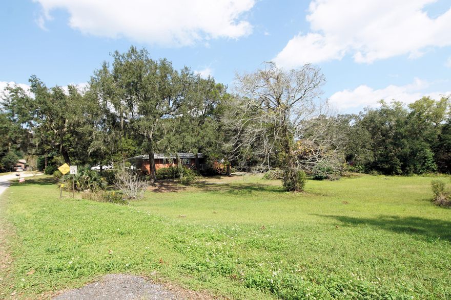 ALSO LISTED as Land Listing MLS 841475. Beautiful home sitting on 1.39 acres across from the Choctawhatchee Bay located in Choctaw Beach! This 3 bedroom / 2 bath home is 1828 sq ft.There is room on this lot to build new! There is an enclosed garage that is a beautiful family room with a fireplace. In addition there is a laundry room next to this family room that also has plenty of storage space! There is a second family room just off the kitchen overlooking the front yard. This room opens to the dining room! The master bedroom has an ensuite bathroom and there is a second full bath for guest near the two guest bedrooms. The home has a front deck overlooking the Choctaw Bay, gutters, and a two car carport. In addition there is a shed for additional storage.
