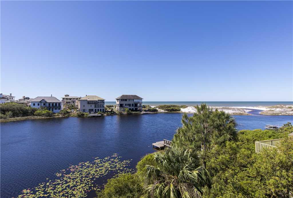 Located on Stallworth Lake, this 4 bedroom/3 bath home is designed around an amazing one-of-a-kind views of the lake and the Gulf, with every room facing the ocean. This home has a timeless architecture and was built by a Master builder to be a ''fortress'' against storms. Home is on 100 feet of a dune lake shoreline with direct access to a secluded Gulf beach. Home is in a quiet neighborhood, just off of 30A, nestled beside Topsail Hill Preserve State Park. Main floor has an open living and kitchen floor plan-great for family gatherings and entertaining. You'll enjoy the best sunrises and sunsets this area has to offer. Relax with the breeze off the water while sitting on the dock on the lake, the living area on the top floor, or anywhere in between.