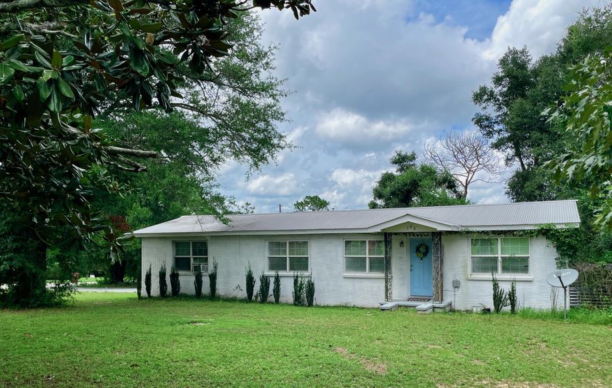 **Investor Special in the Heart of Crestview!**This 1956 off-grade brick home sits on a spacious 1/2 acre corner parcel made up of two lots, offering the potential to subdivide the additional lot for resale or new construction. There is also plenty of room to park your RV or boat, and no HOA. This property is a great opportunity for cash investors or buyers using conventional financing or renovation loan who are looking to add equity through renovations.Previous  4 Point inspection from 2019 states that the metal roof was installed in 2018, the HVAC in 2014. The home now needs some repairs and cosmetic updates to bring it back to its full potential. Notable issues include wood rot around some door frames, poorly installed flooring with visible gaps, peeling exterior paint, a couple of water stains on ceilings, needs full interior paint job and exterior pressure washing, and has peeling laminate countertop in the kitchen (the kitchen island has beautiful granite in good condition). Additional general updates are needed throughout.

This is a solid structure with great bones and loads of potential, especially given the large lot and possible subdivision opportunity- call the City zoning office to verify if allowable for your particular plans. Whether you're looking to renovate and resell, build an additional home, workshop or accessory dwelling unit, or create a long-term rental, or make this your new home, this property offers flexibility in a convenient Crestview location.  Call the city zoning office to verify if any potential lot split or addition of other structures is allowable.

Being sold as-is. Cash or conventional financing only. Don't miss this value-add opportunity!
