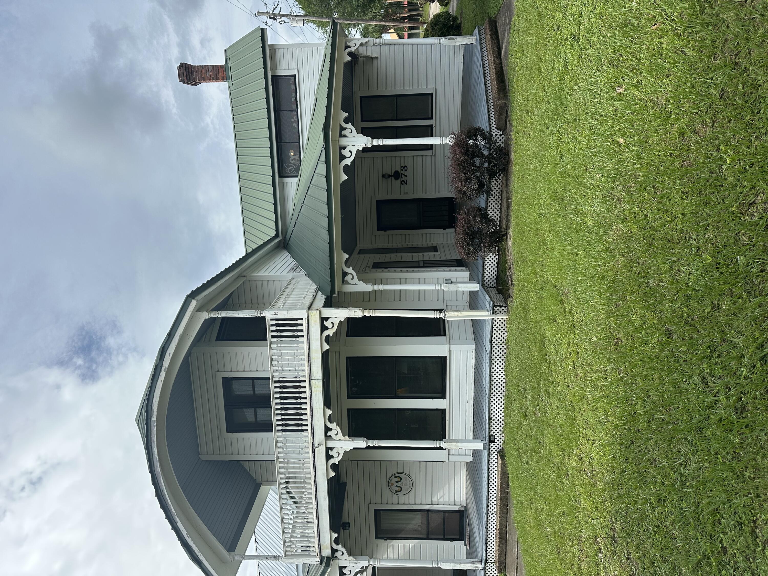 Professional Photos Coming Soon! Don't miss the chance to own a piece of history with this stunning 1895-1900 Queen Anne-style Victorian home! Located in the Historic District of DeFuniak Springs, this property is just half a block from the oldest library in the state of Florida and the picturesque Lake. With over 3,000 square feet of living space and beautiful covered porches, this home truly allows you to step back in time. As you enter, you'll find spacious rooms adorned with exquisite detailing, a fireplace, and built-in bookcases in the library. The home has been thoughtfully renovated and updated with modern conveniences while preserving its historic charm. The kitchen features ceramic tile flooring, and granite countertops. The master bath includes a luxurious jacuzzi tub complemented by beautiful tile flooring. Adjacent to the kitchen is a family room/home office that invites ample natural light into the space. The combination mudroom/utility room includes a separate shower for added convenience.
This property boasts two separate staircases, a sprinkler system, and two antique outdoor streetlamps that will remain with the home. The home doesn't have central heat/air. Portable AC units are being used to cool the home.
Additionally, there is a spacious detached carport (24x32) with an attached workshop (12x24). This home was featured in Victorian Homes Magazine, and its photo has been widely used to showcase the Historic District of DeFuniak Springs.
Don't miss the opportunity to make this true piece of history yours today! All dimensions and square footage are deemed reliable but should be confirmed by the buyer at their expense. Please note that the property is located in the Historic District and is subject to the Historic Ordinance. A metal roof was installed in 2011, and the wiring and plumbing, including the shop, were completely updated in 1987 with heavy-duty 200-amp service.